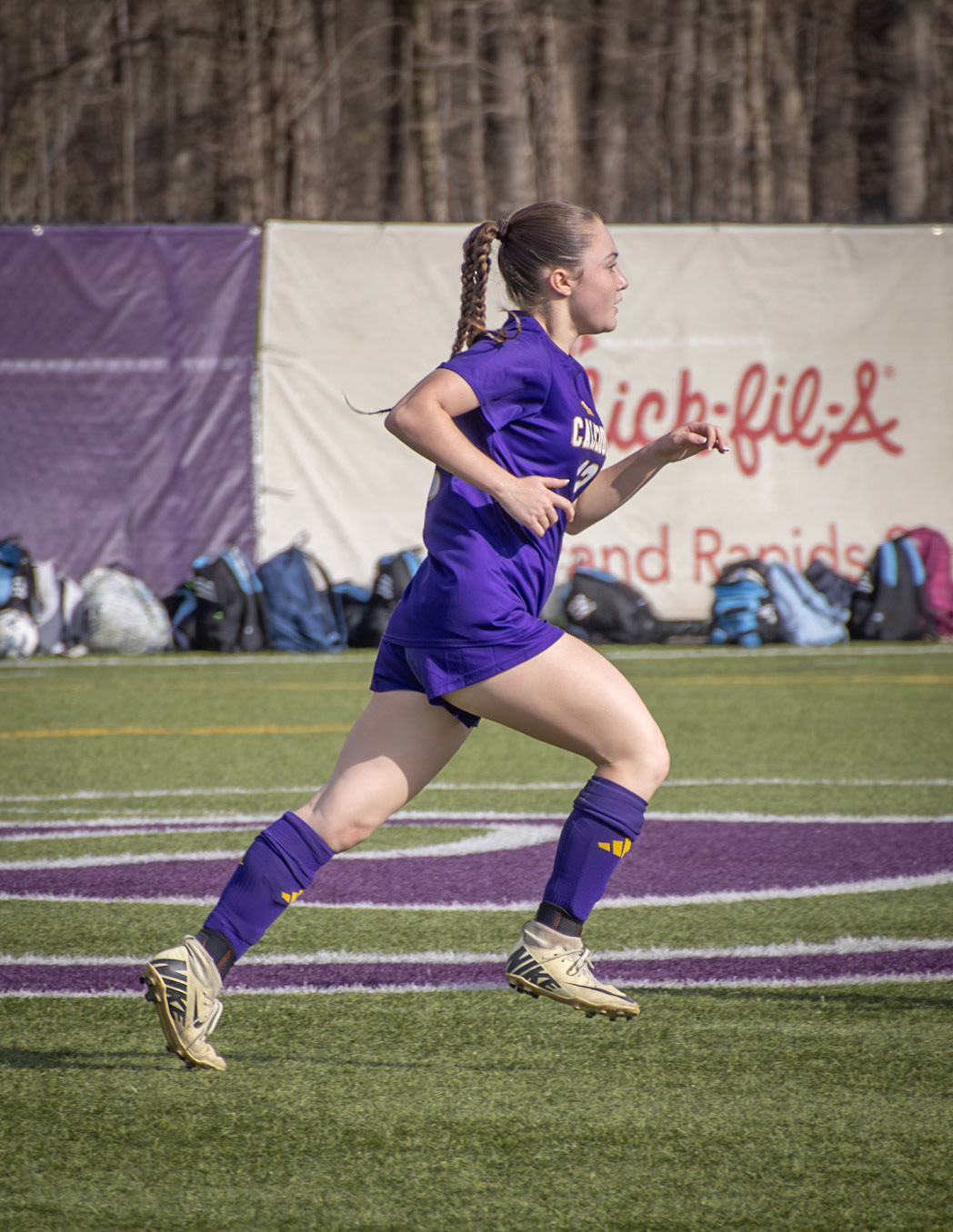 Kendal Licari sprints across the field to support her teamates on the attack. (Photo by Emma Garza)