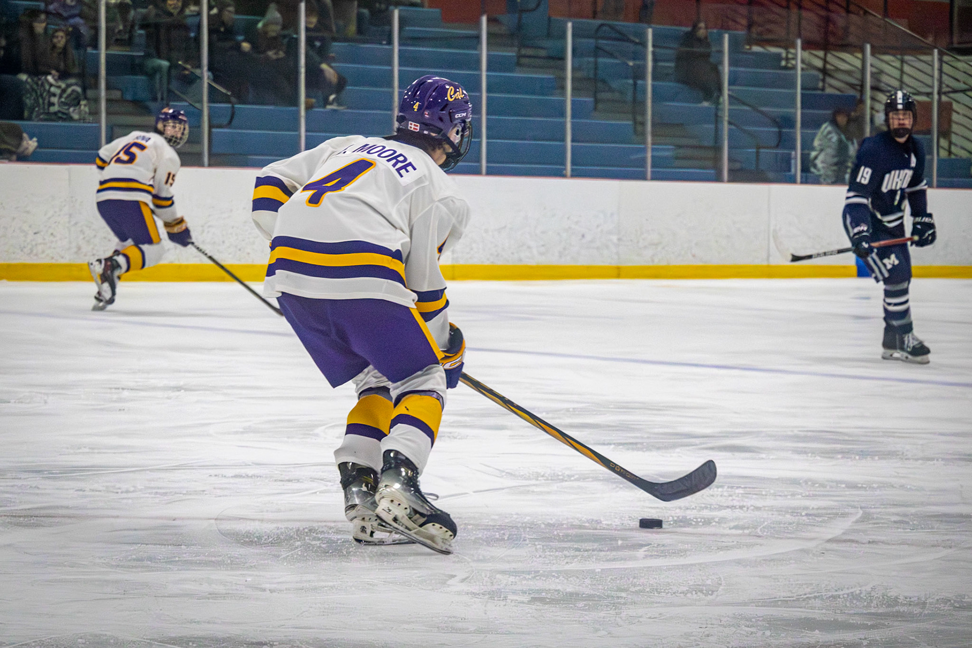 Skating down the ice defender Evan Moore looks down the ice to see his open teammate Ethan Sova ready for a pass. (Photo by Ella-Grace Wickens)