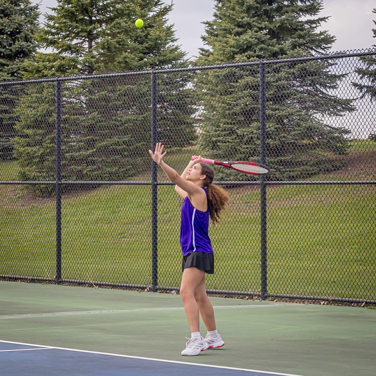 Peyton Walker prepares to return the ball, aiming to keep control of the rally and secure another point with her partner. (Photo by Abby Skibinski)