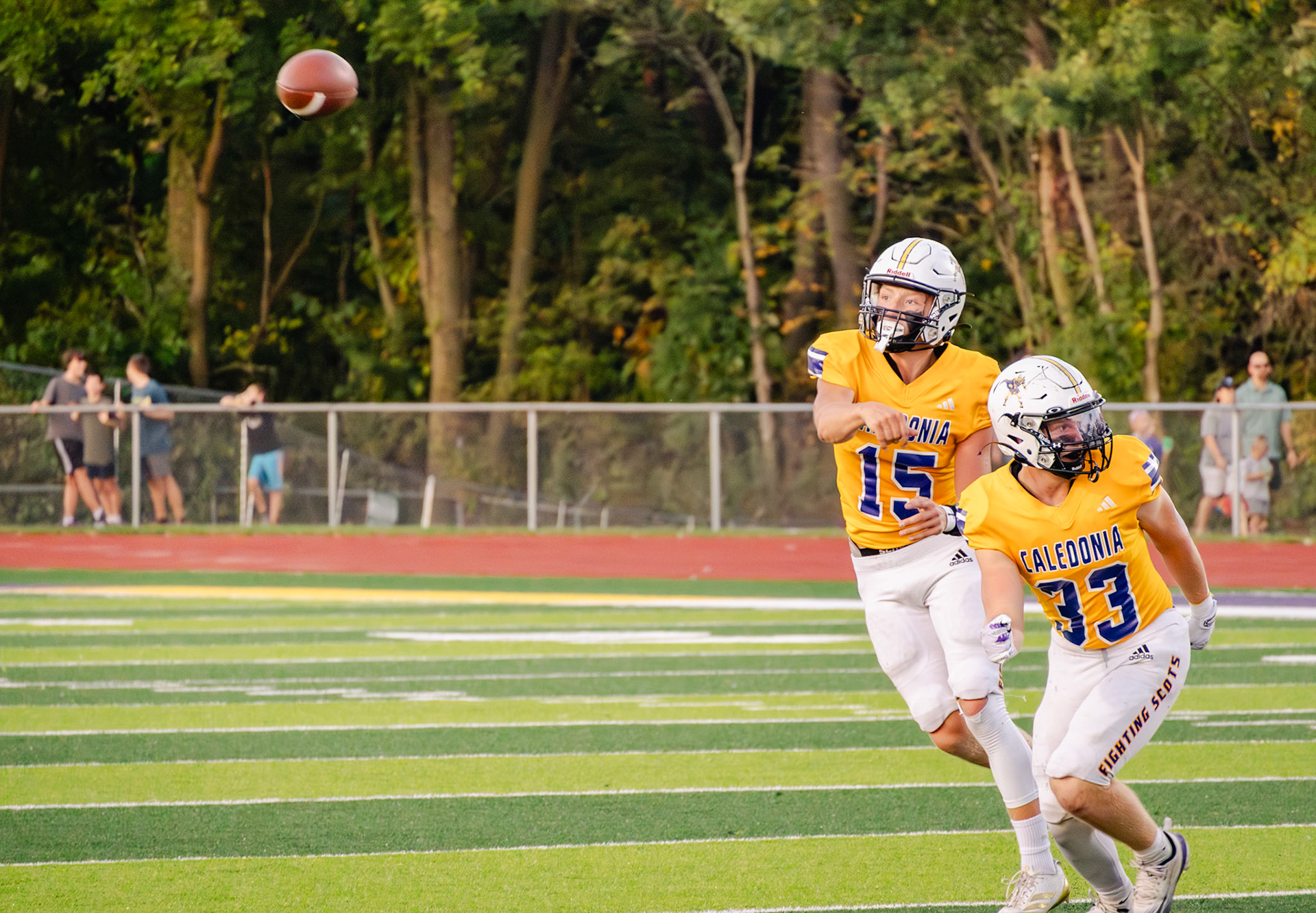 Quarterback Andrew Hanna throws a perfect pass, leading to a touchdown. (Photo by Taya Penoes)