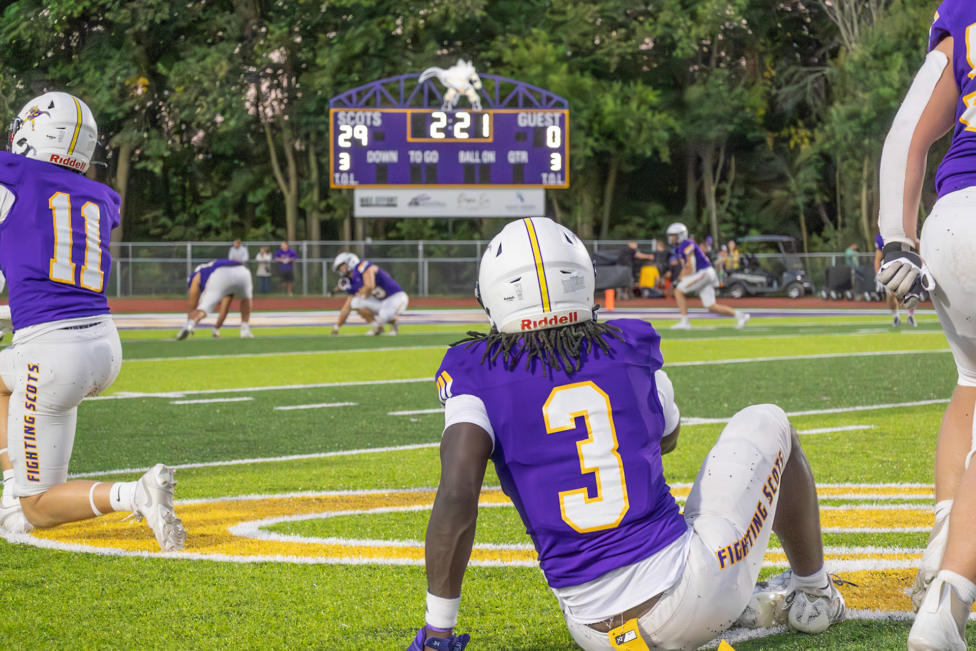 HALFTIME Stretching it out after the locker room, the Scots get ready for the second half with a 29–0 lead over Windsor Holy Name. (Photo by Egan Otto)