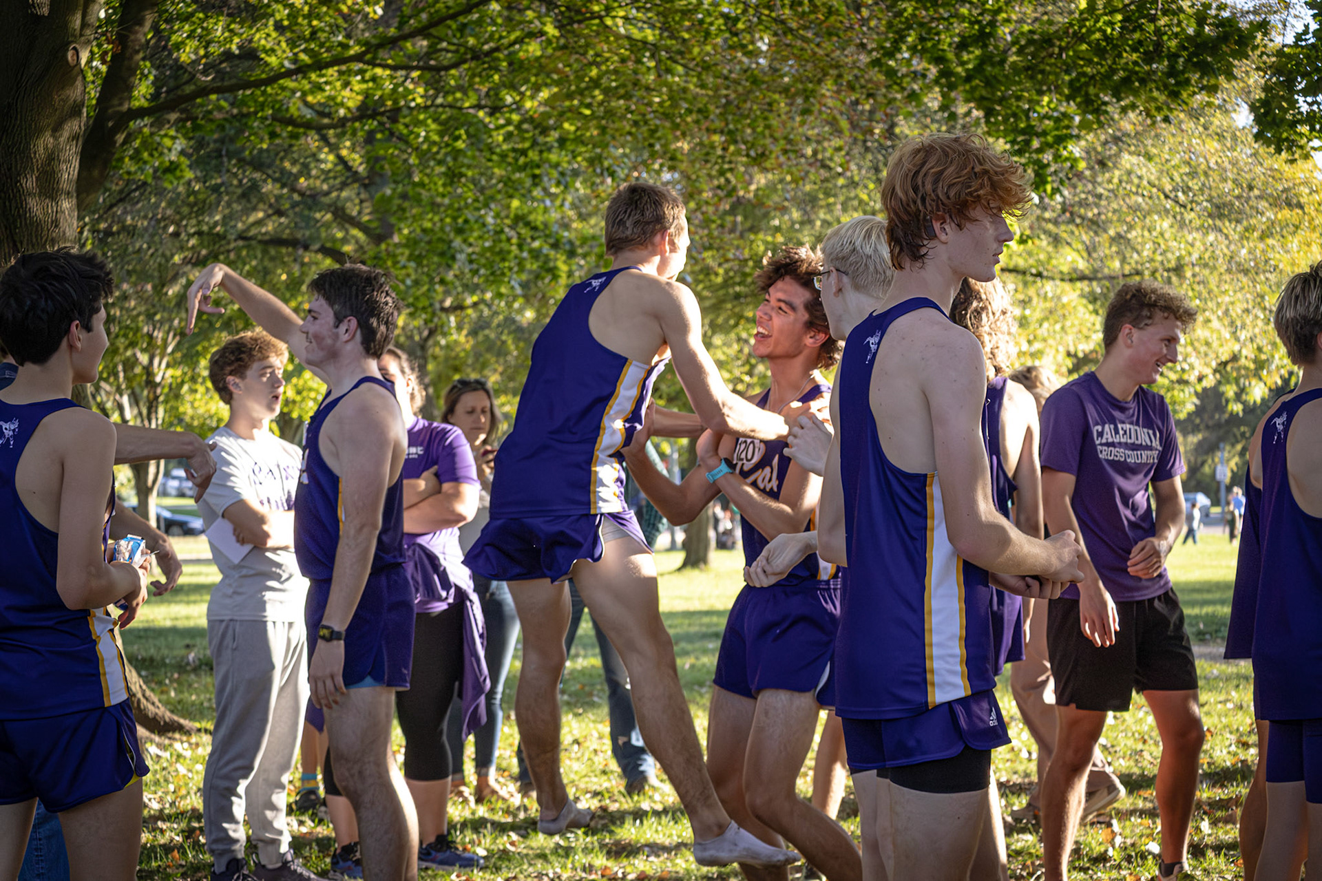 Jake Potgetter Jumps for joy with Ian Kimbrell when they hear they won their conference meet.(Photo by Akaela Daman)
