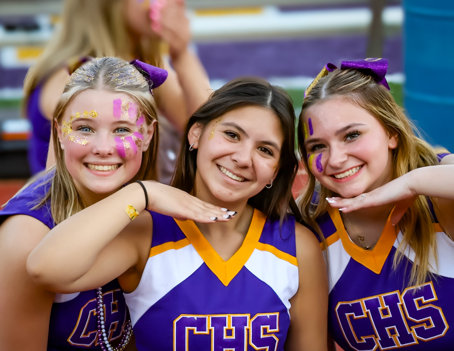 Seniors Juliana Apo and Chloe Smith, along with freshman Addison Vissel, are gearing up and ready to hype up the crowd for the Homecoming! (Photo By Brianna Severson)