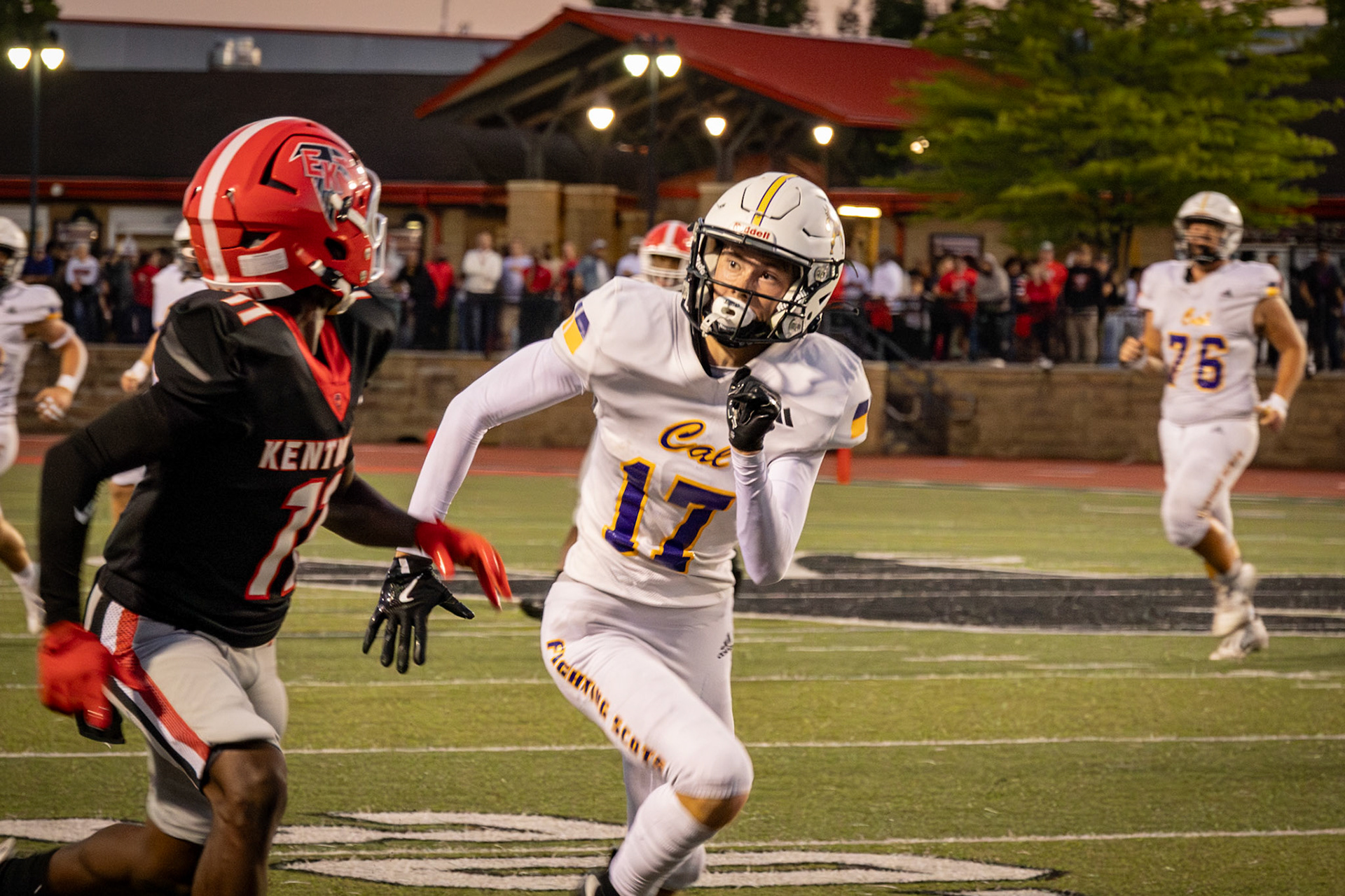 Junior Miles Grengs evades an East Kentwood defender as he works to get open for a pass. (Photo by Avarey Lippert)