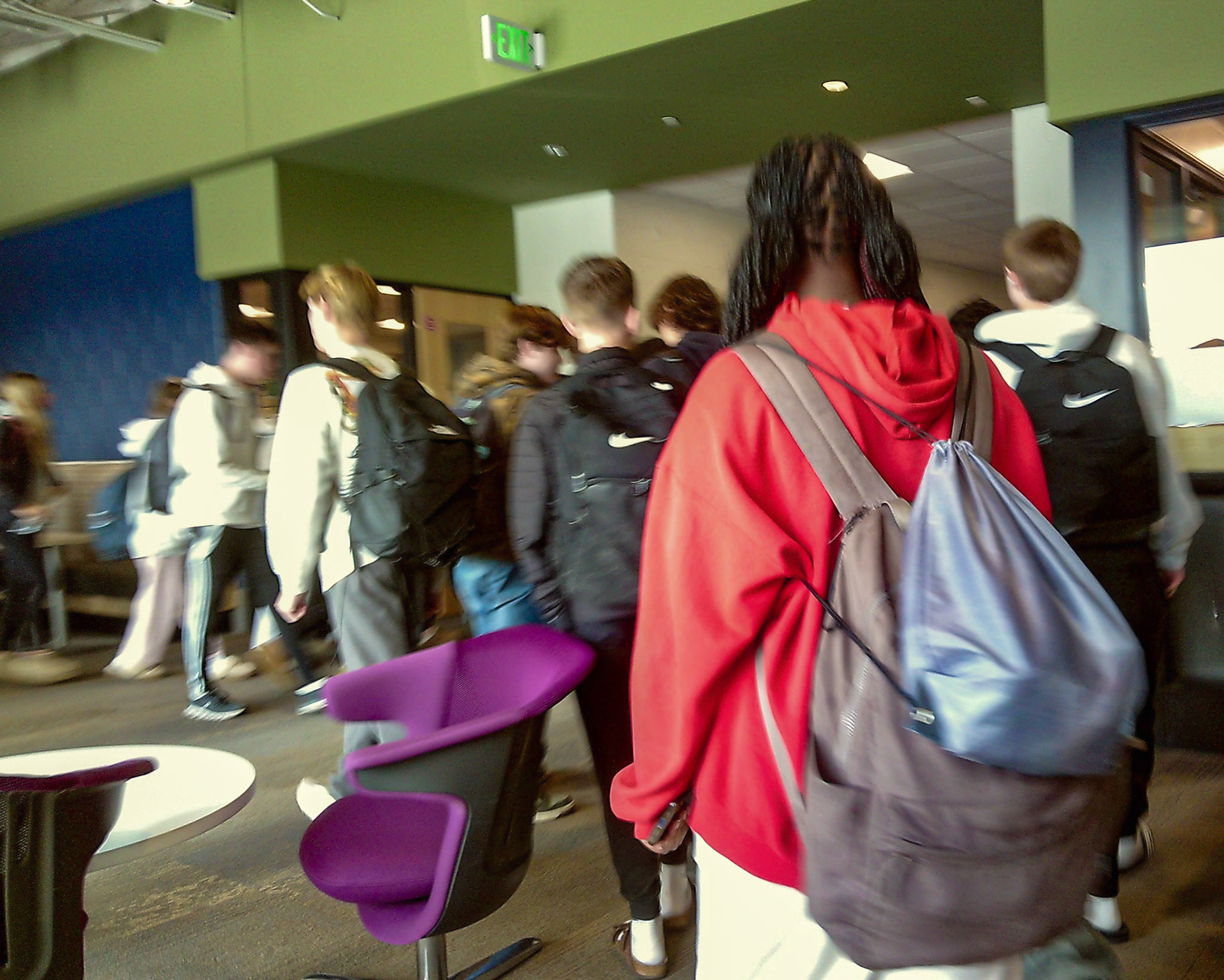 LUNCH RUSH After class students rush to lunch. (Photo by Sophie Grajewski)