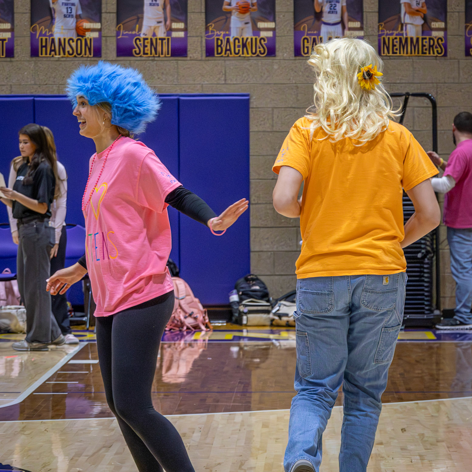 Moggie Loomis raced, laughed, and competed in the student wig-snatching game, keeping everyone cheering.  (Photo by Lilli Jackson)