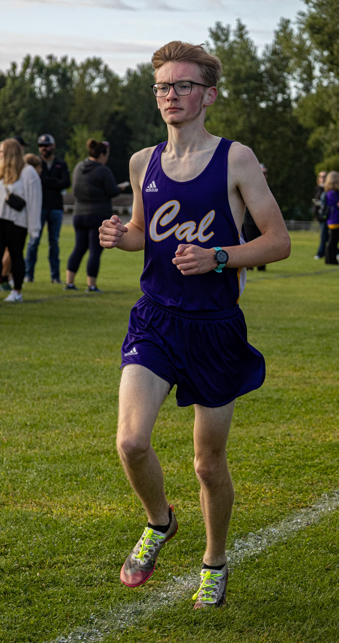MILES OF MOTIVATION Benji Rewa pushes through every stride. (Photo by Akaela Daman)