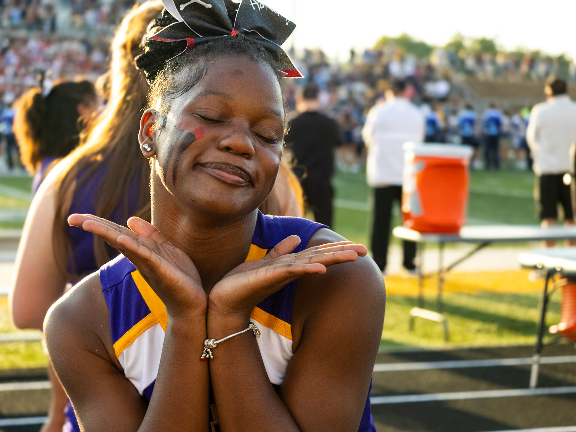 Even between cheers, AhNya Pittman fills every moment with energy and fun during the Caledonia vs. Hudsonville game. (Photo by Lillian Jackson)