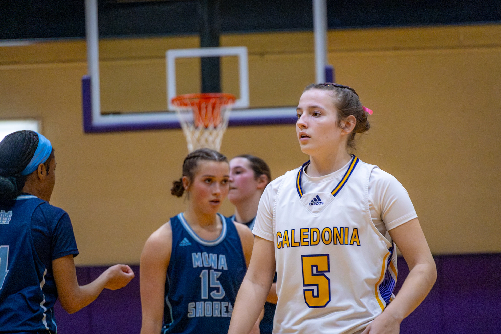 Scarlett Hoffa listens to the referee's call. (Photo by Abigail Douglass)