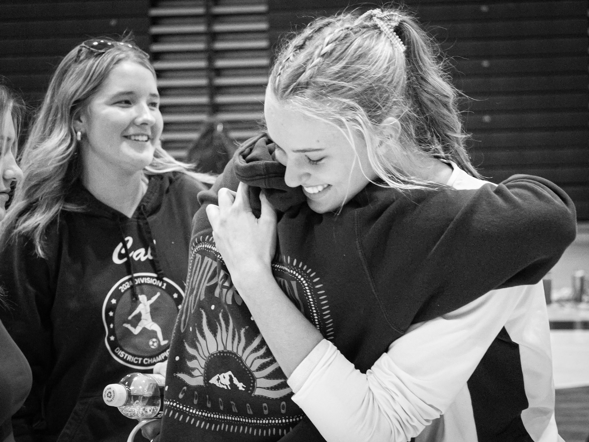 Senior Maggie Loomis believes "This was a special moment for me because my friend from my old school at Saugatuck drove to show her support which meant a lot -- especially on my senior night."(Photo by Tana Coates)