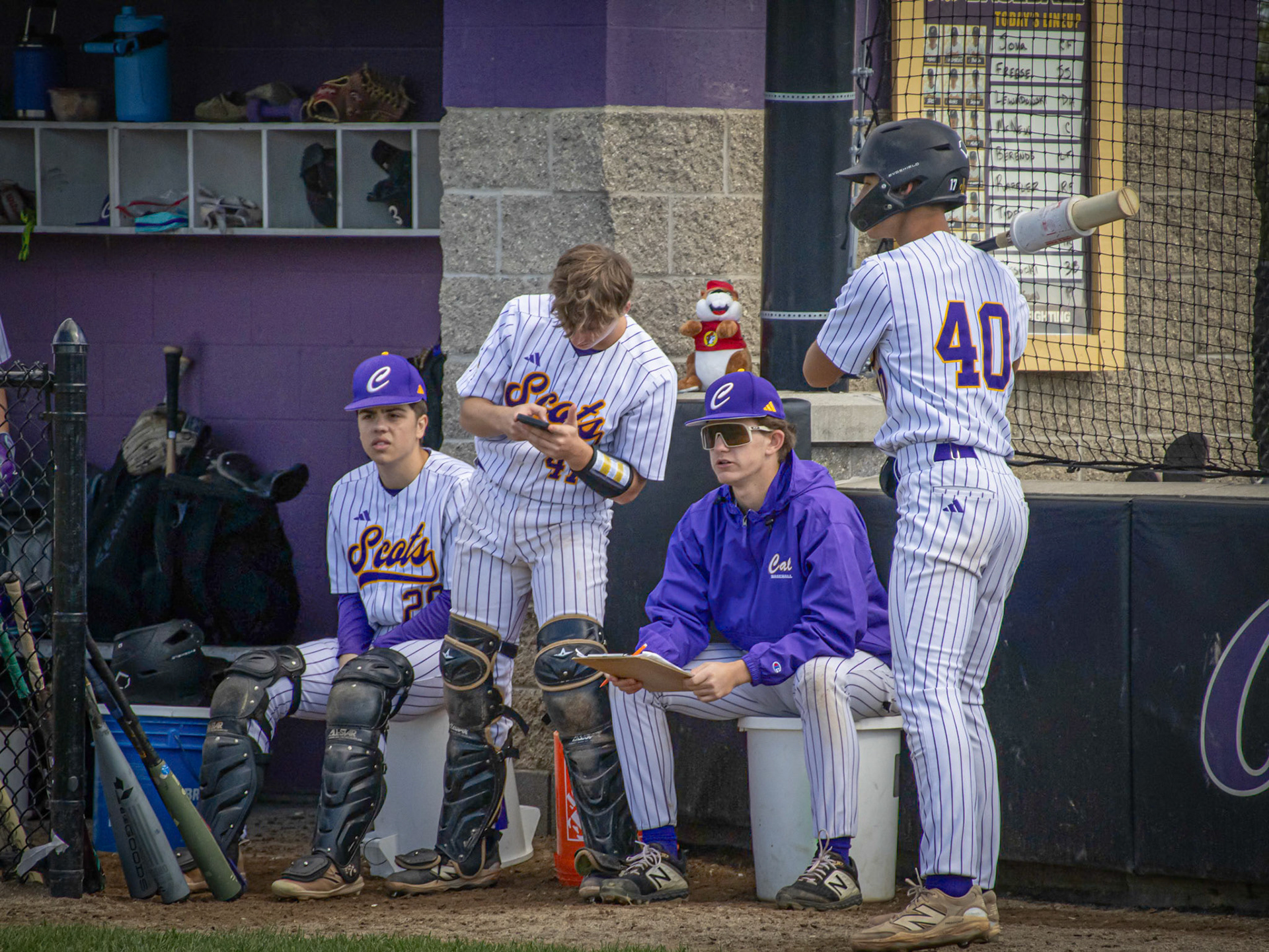 Following a close call at 3rd, Sawyer Tague and Brenan Burns stare at the umpires to make their final call. (Photo by Ella-Grace Wickens)