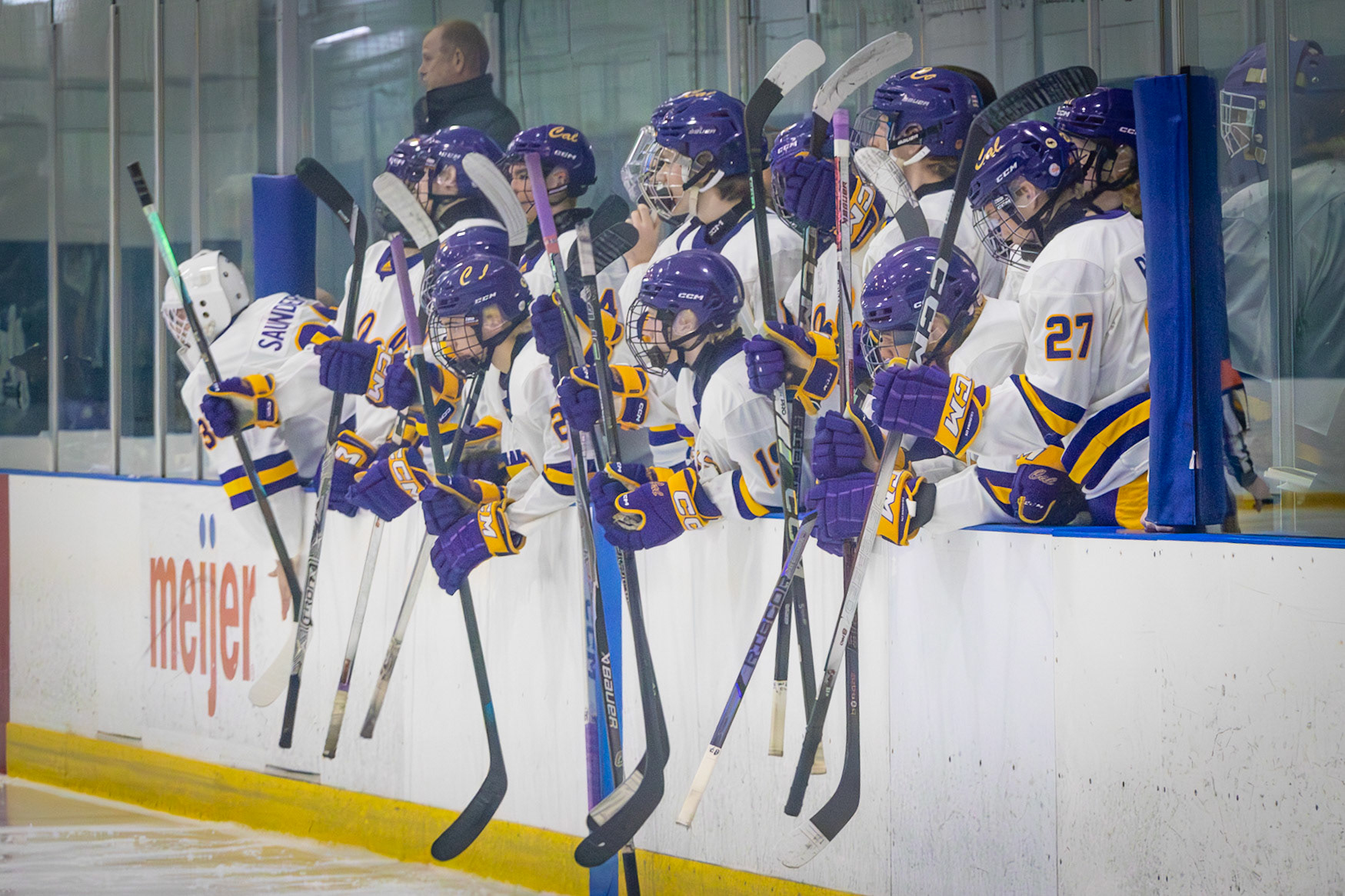 Cal Hockey hits the boards as they take the ice. (Photo by Aaron Pyper)