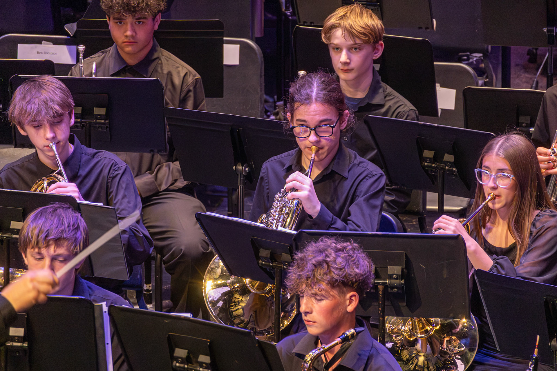 French horns in the freshman band watch the conductor for their cue. (Photo by Eva Sierra)