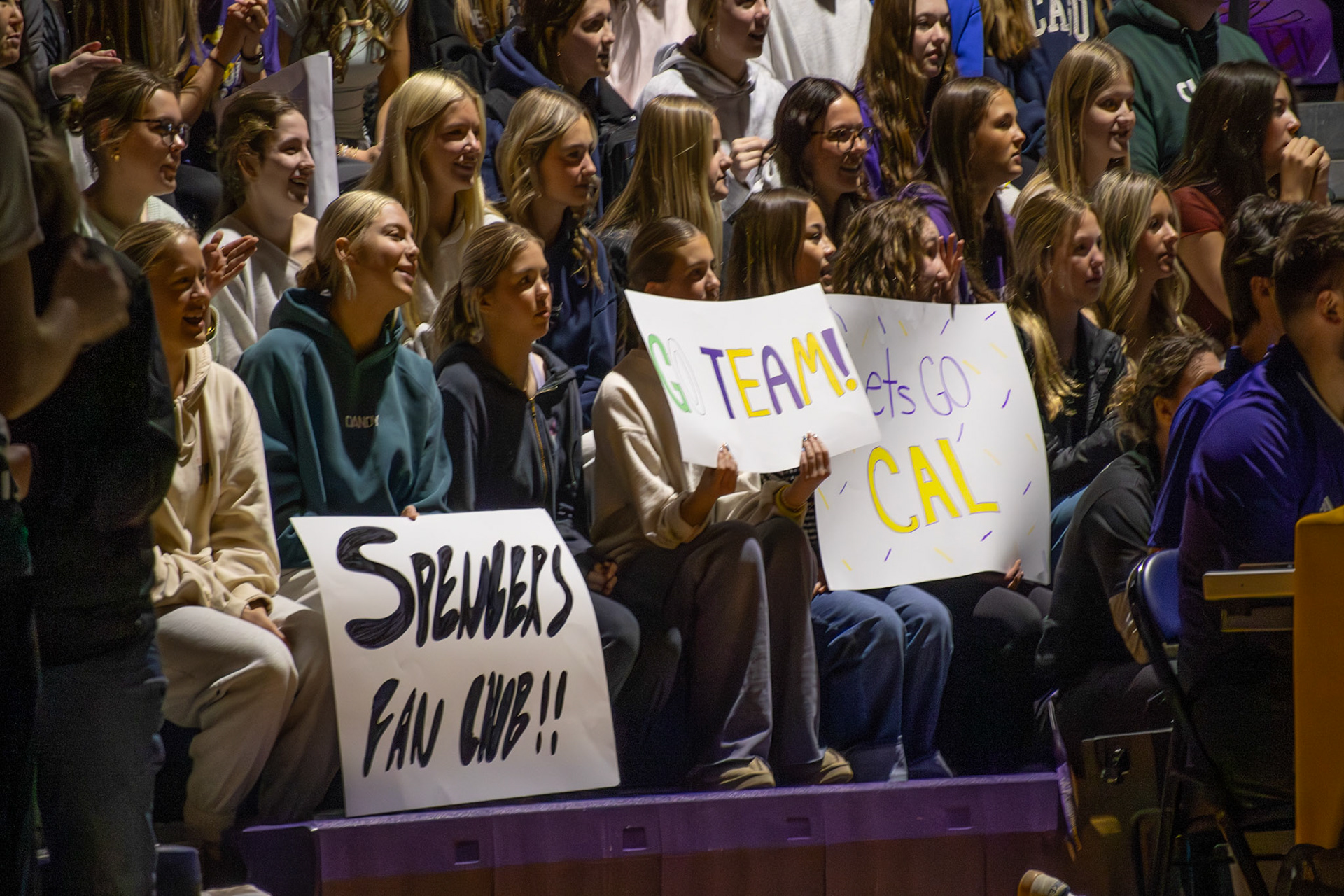A group of sophomores show their support for the Caledonia Unified team by creating handmade signs and cheering them on during the game. (Photo by Abby Skibinski)