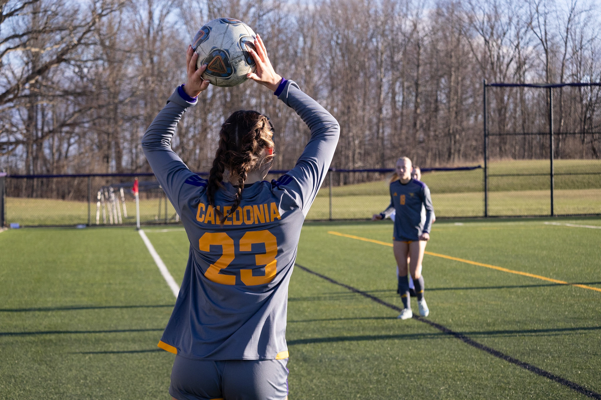 Kayla Briseno launches a quick throw-in from the sidelines, sending the ball to her teammates. (Photo by Rhyan Guzman)