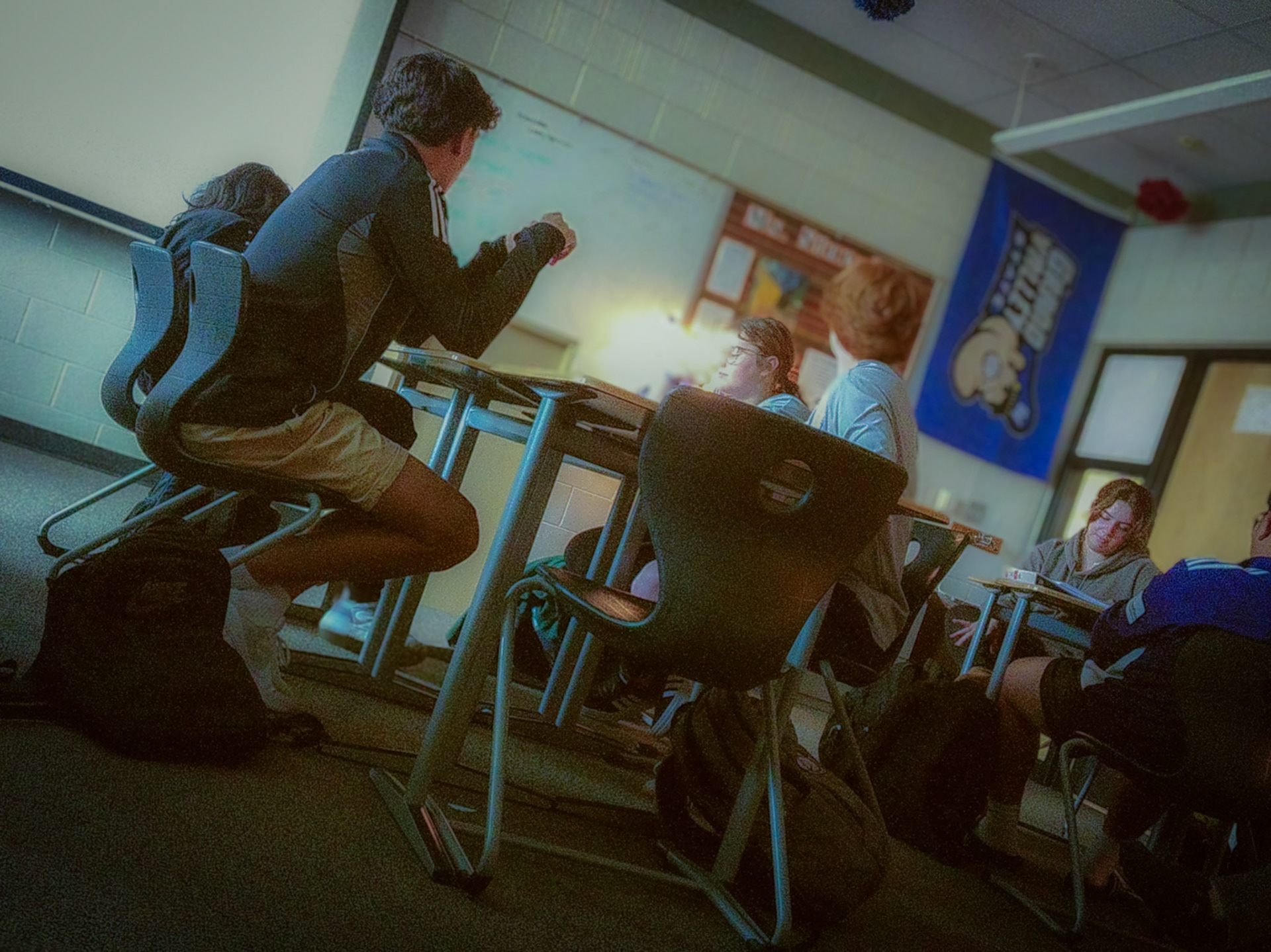 INTO THE WILD Liam Siggerud, Julia Tietz, Pietro Maestri Mamprin, and Stephanie Juarez discuss Chapter 6 of Into the Wild with their table group. (Photo by Lauren Parker)