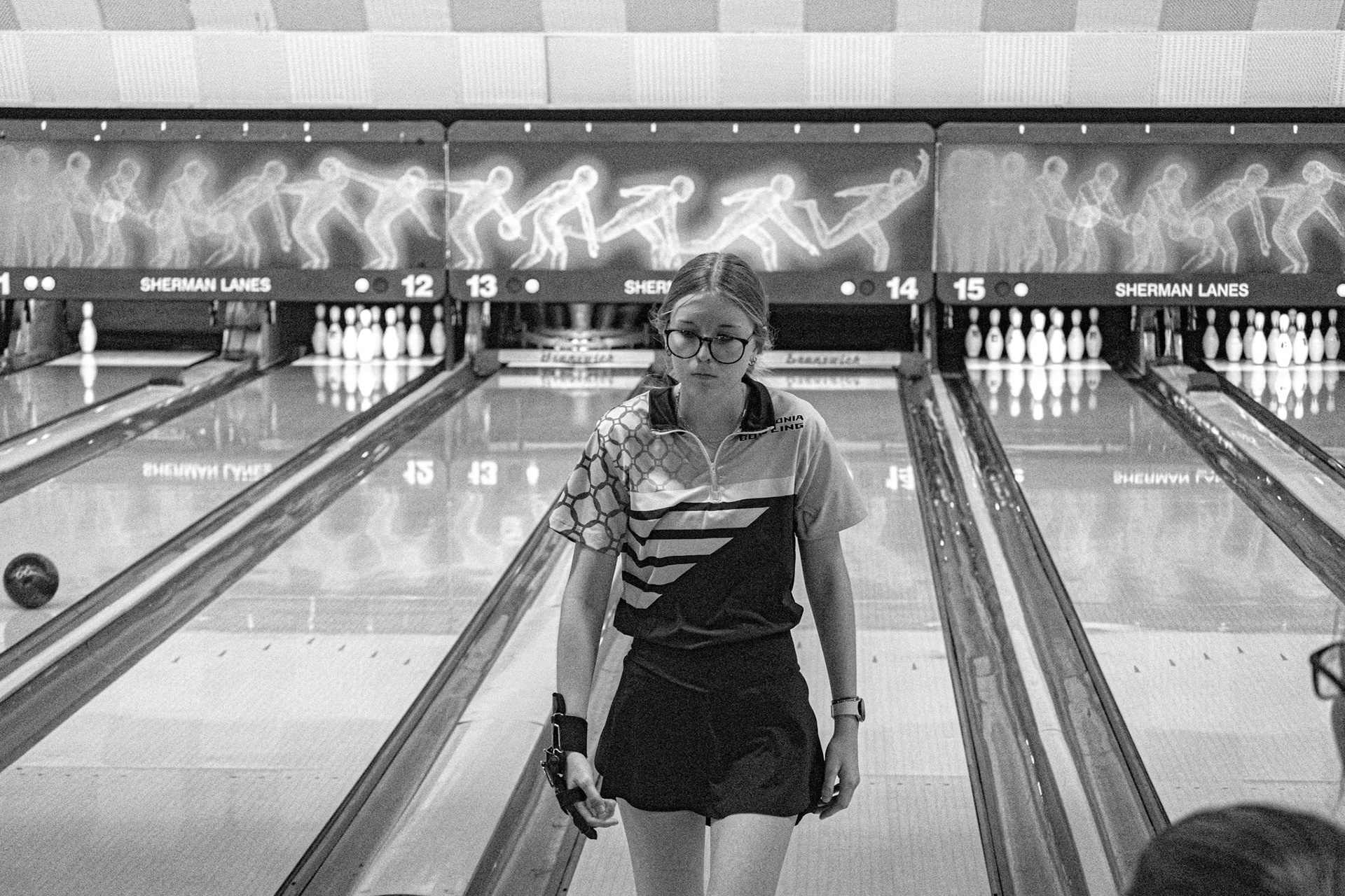 Riley Kalacanic calmly walks away after hitting a strike. (Photo by Joseph Dunn)