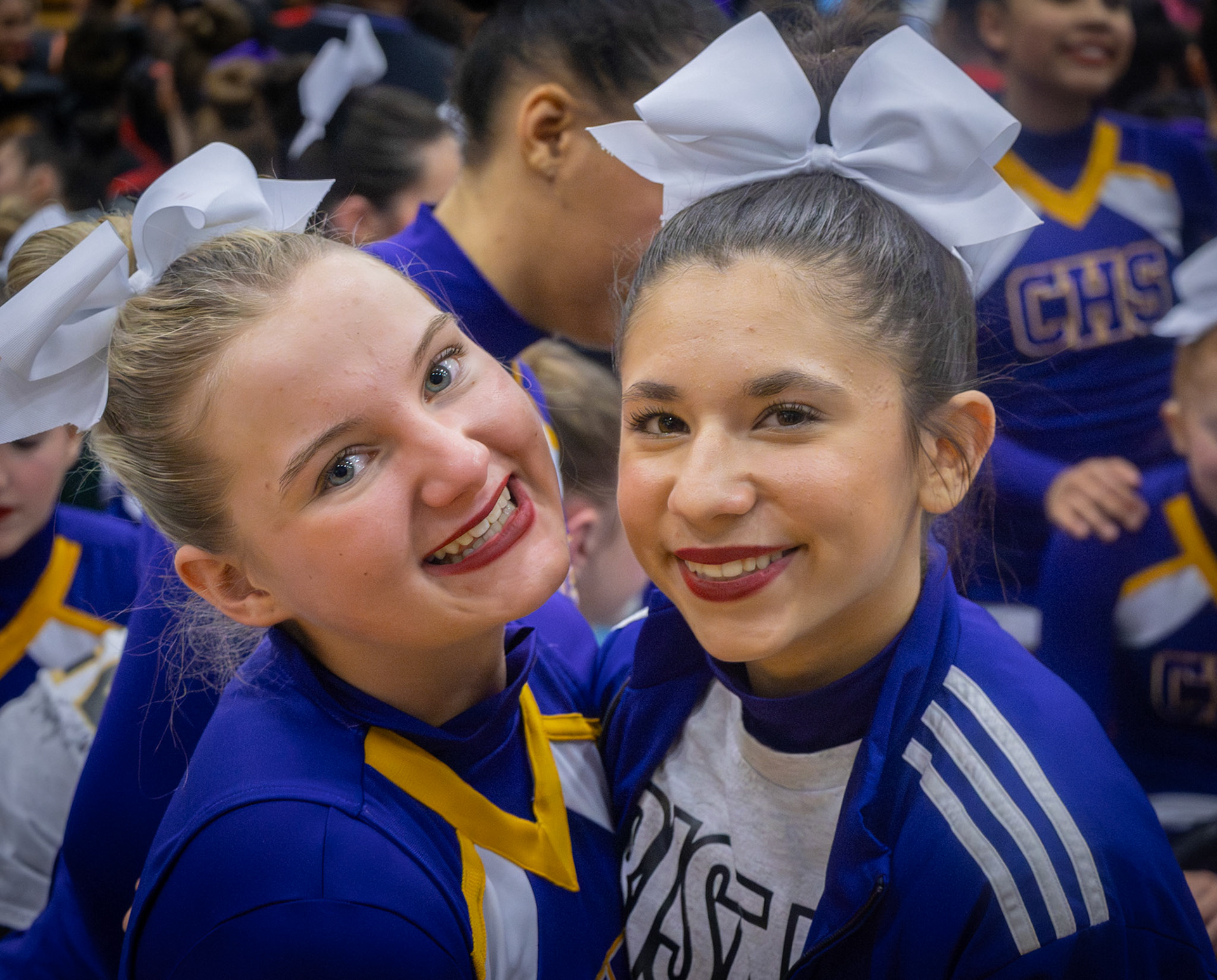 After a long day of competition, Adelynn VanderZand and Reagan Stevens wait for placements, reflecting on the work that led them to this moment. (Photo by Lilli Jackson)