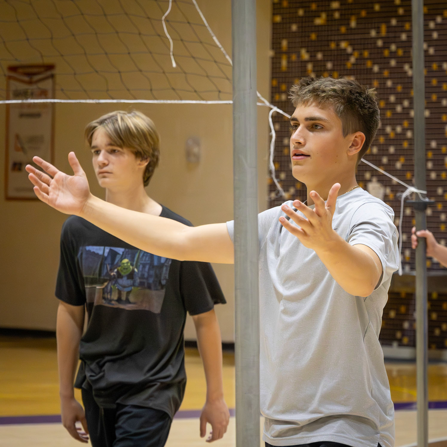 Miles Fynewever throws his hands up in frustration after a call sends the ball out, believing it hit the line. (Photo by Ella-Grace Wickens)