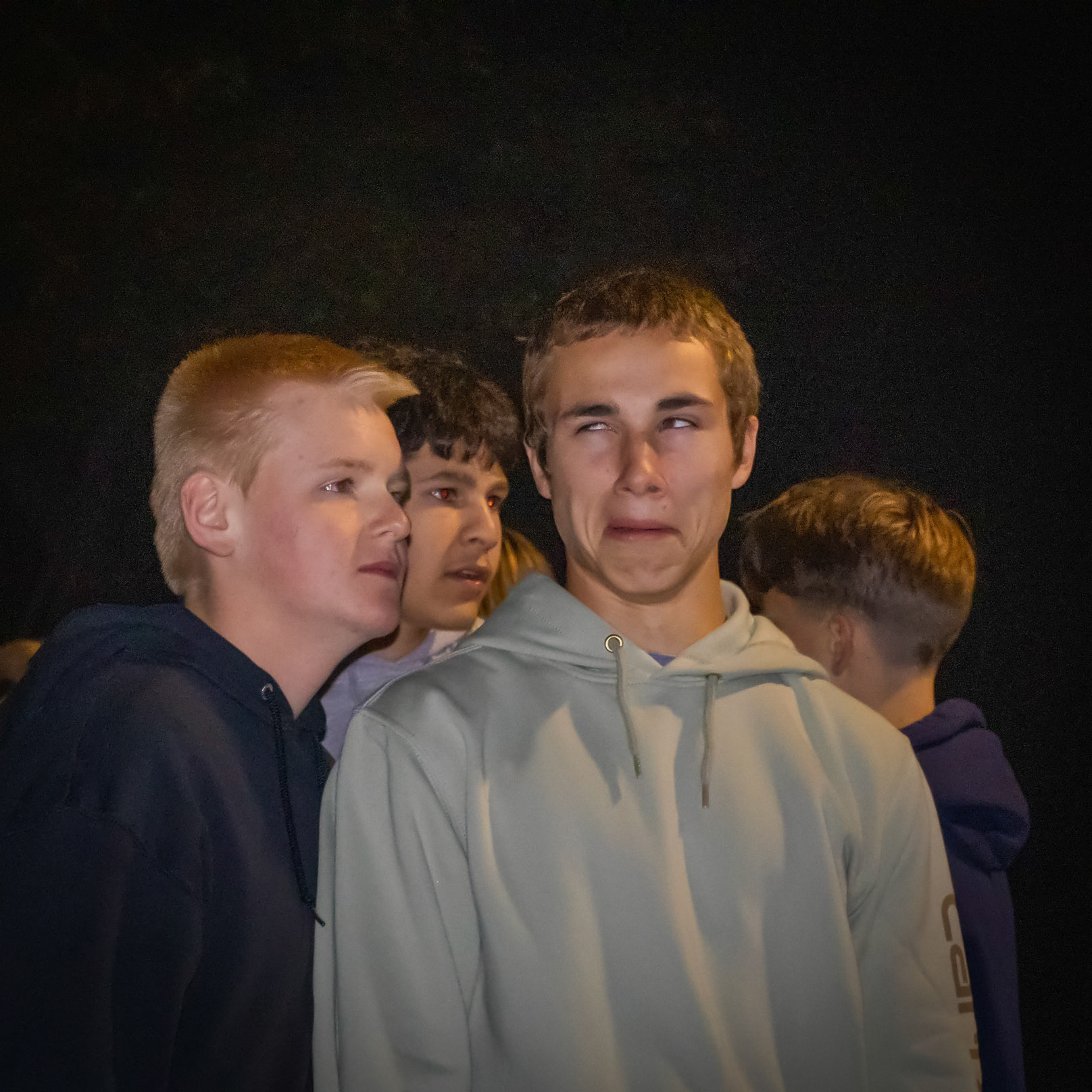 Jake Potgeter pulling a goofy face before braving the dark woods with his buddies Cooper Sowerby and Alex Brady. (Photo by Mackenzie Popma)