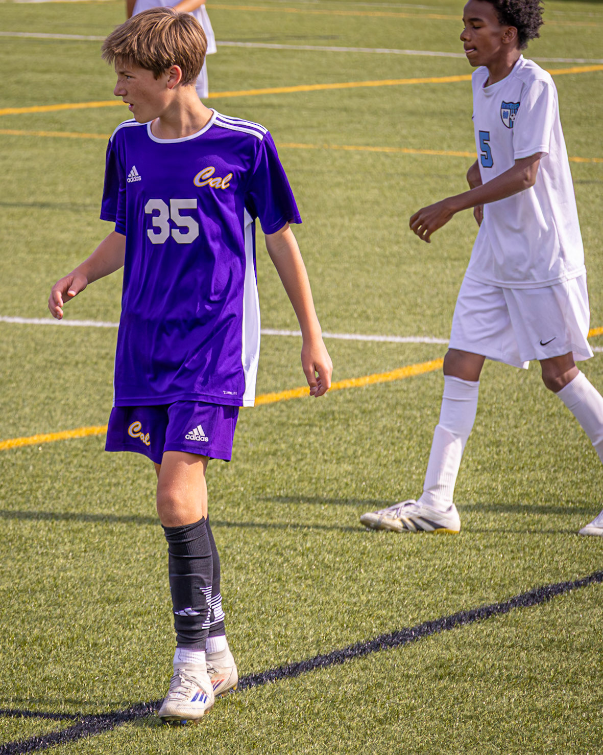 After the victory against Mona Shores, Liam Dunlap makes his way across the field. (Photo by Rhyan Guzman)