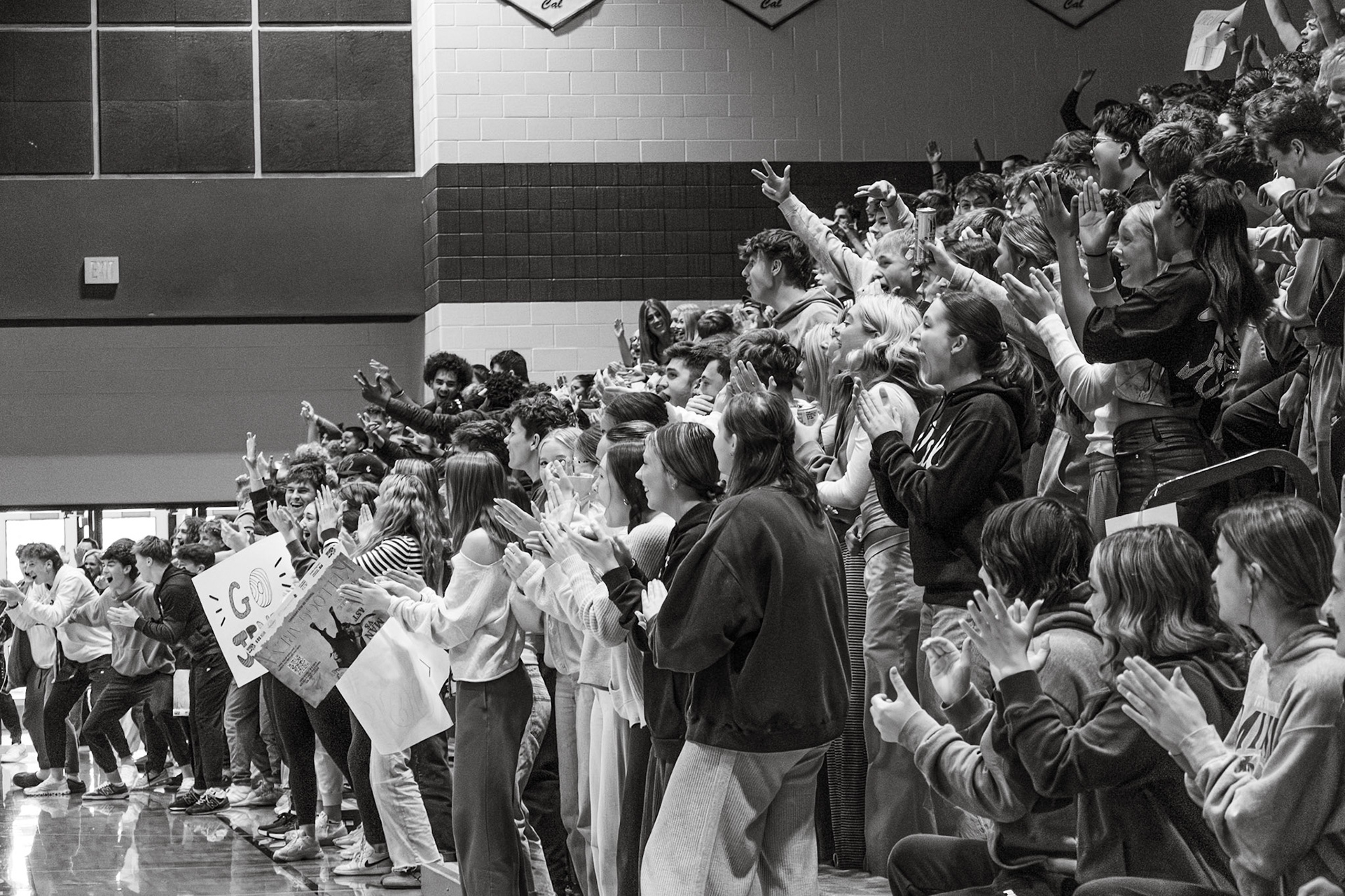 After a Unified player on Jenison’s team scored, juniors and seniors cheer and celebrate, bringing energy and school spirit to the stands. (Photo by Abby Skibinski)