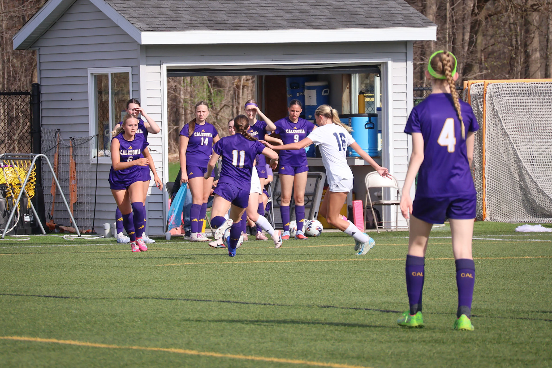 Remy Meyer and Keira Doerr work together challenge the opposing team for possesion. (Photo by Emma Garza)