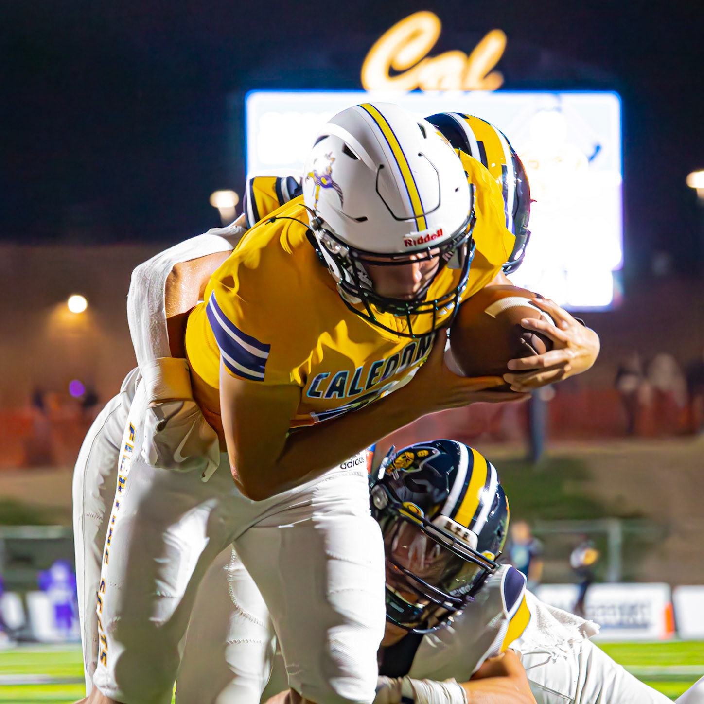 Conlan Schultz fights through the tackle and powers his way to a Caledonia touchdown. (Photo by Egan Otto)