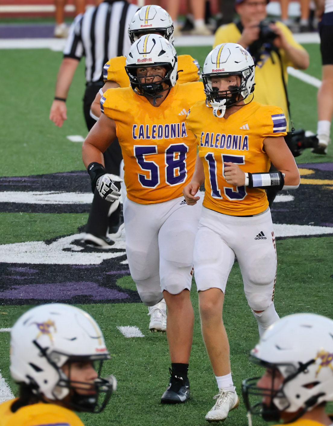 Seniors Andrew Hannah and Liam Moore stride off the field after securing the game’s first possession. (Photo By Brianna Severson)