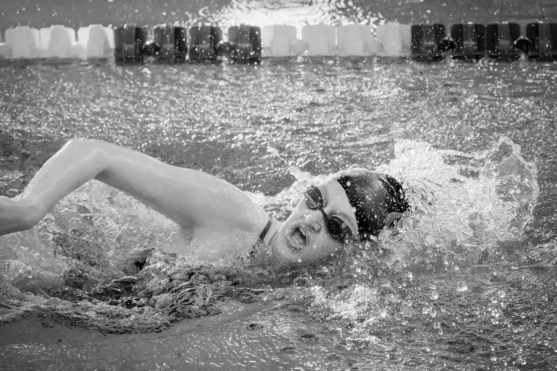 Lyla Keller powers through the 200 free against Wayland. (Photo by Abby Skibinski)