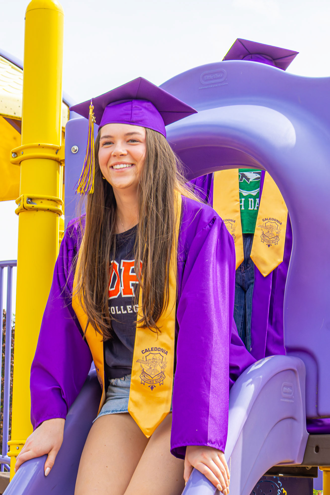 Peyton DeHorn plays on the playground of her past just once more. (Photo by Sophie Grajewski)