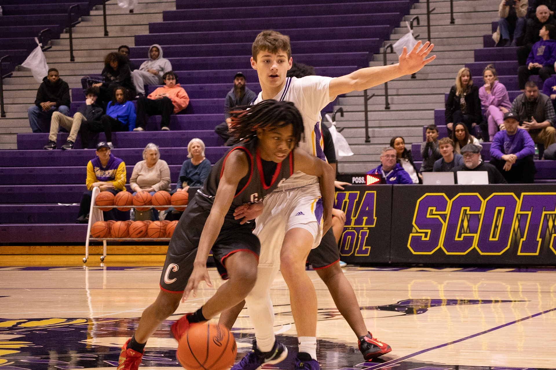 Freshman Austin Guider steps in to disrupt the play, attempting to block a pass and keep the ball out of the opponent’s hands. (Photo by Judah Dorband)