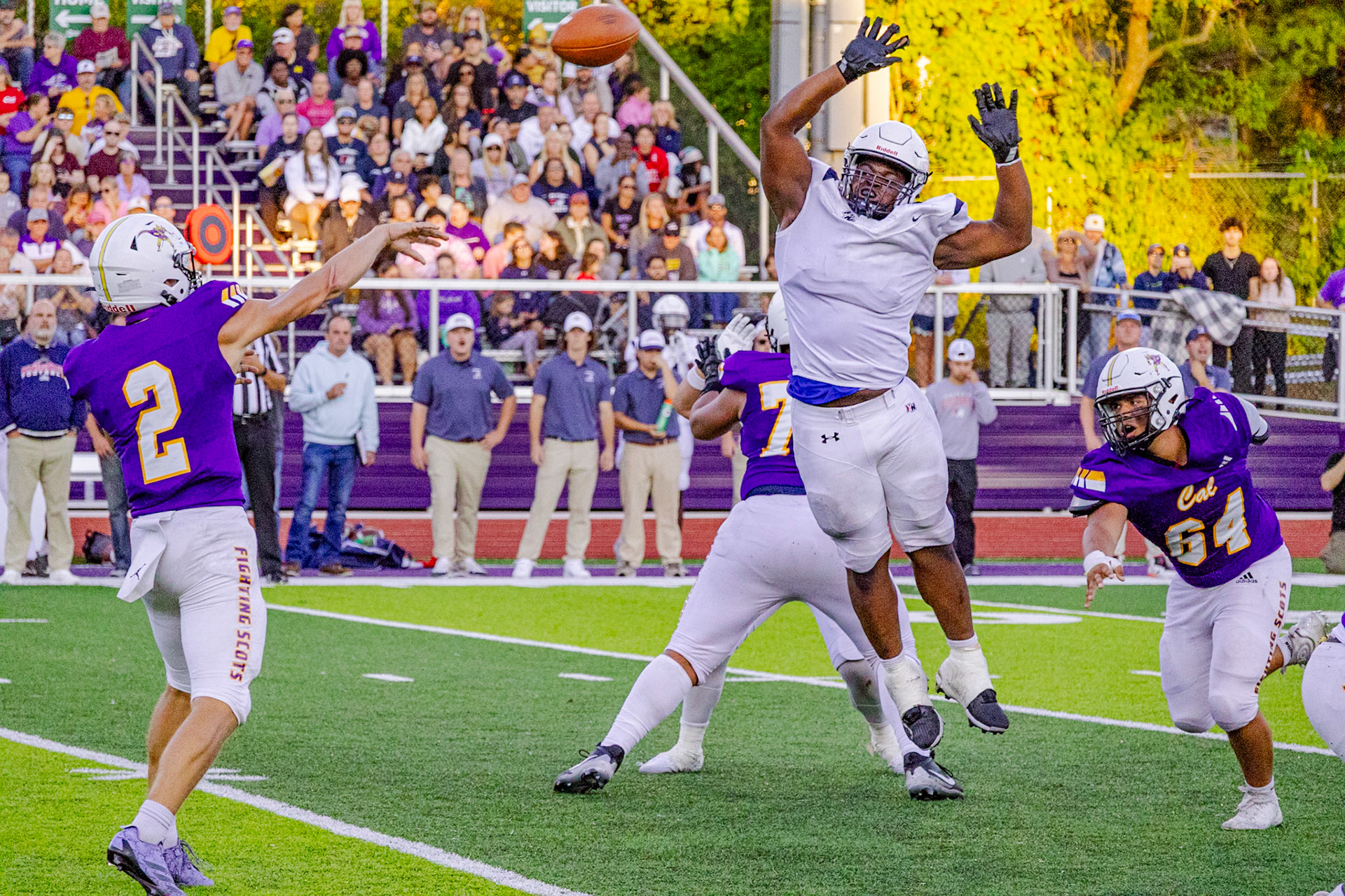 Bryce Backus releases a high-stakes pass that sails just beyond a defender’s outstretched hands.(Photo by Egan Otto)