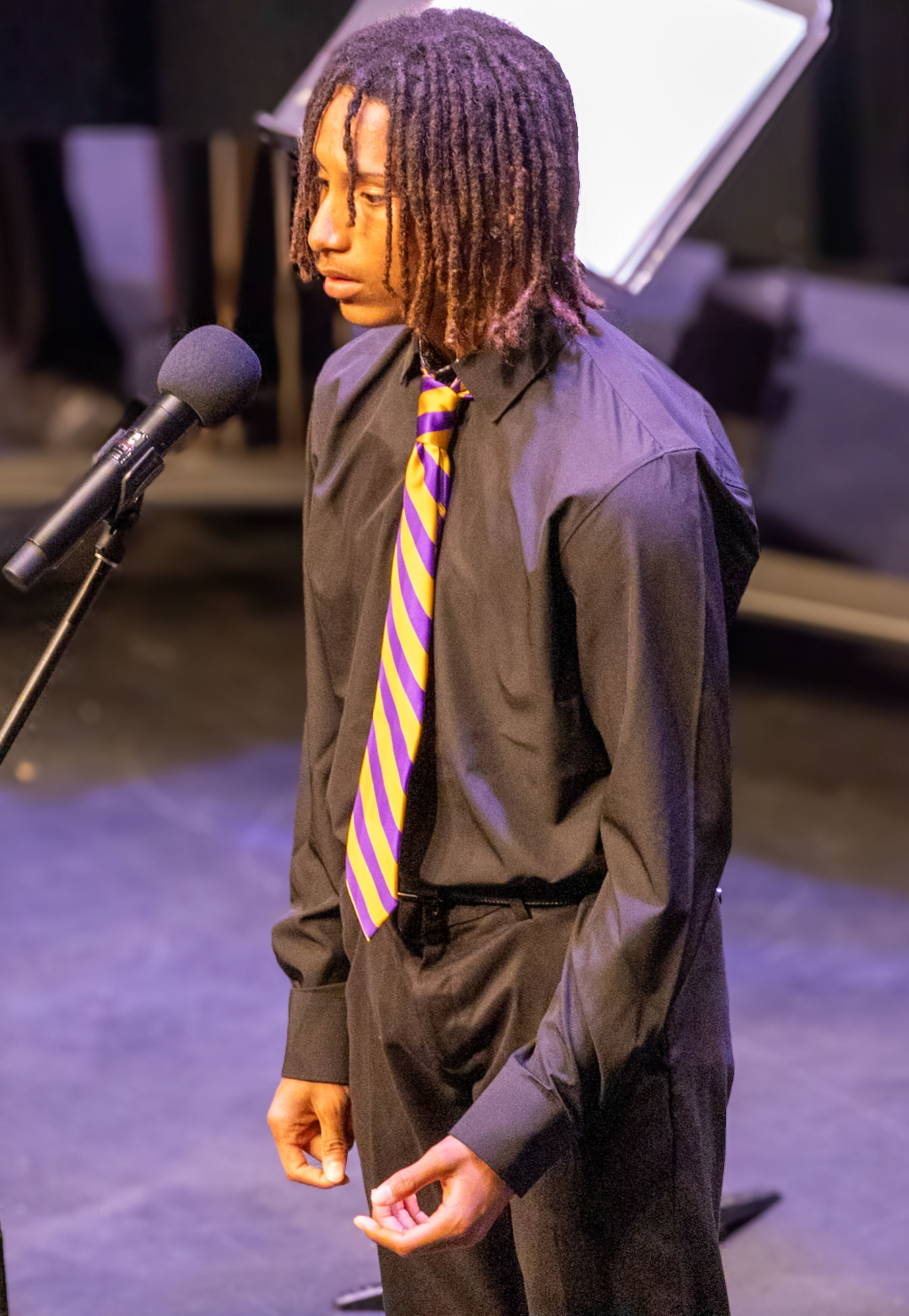 Freshman Shawn Restau shines in a tenor/bass solo during the choir performance. (Photo by Brianna Severson)