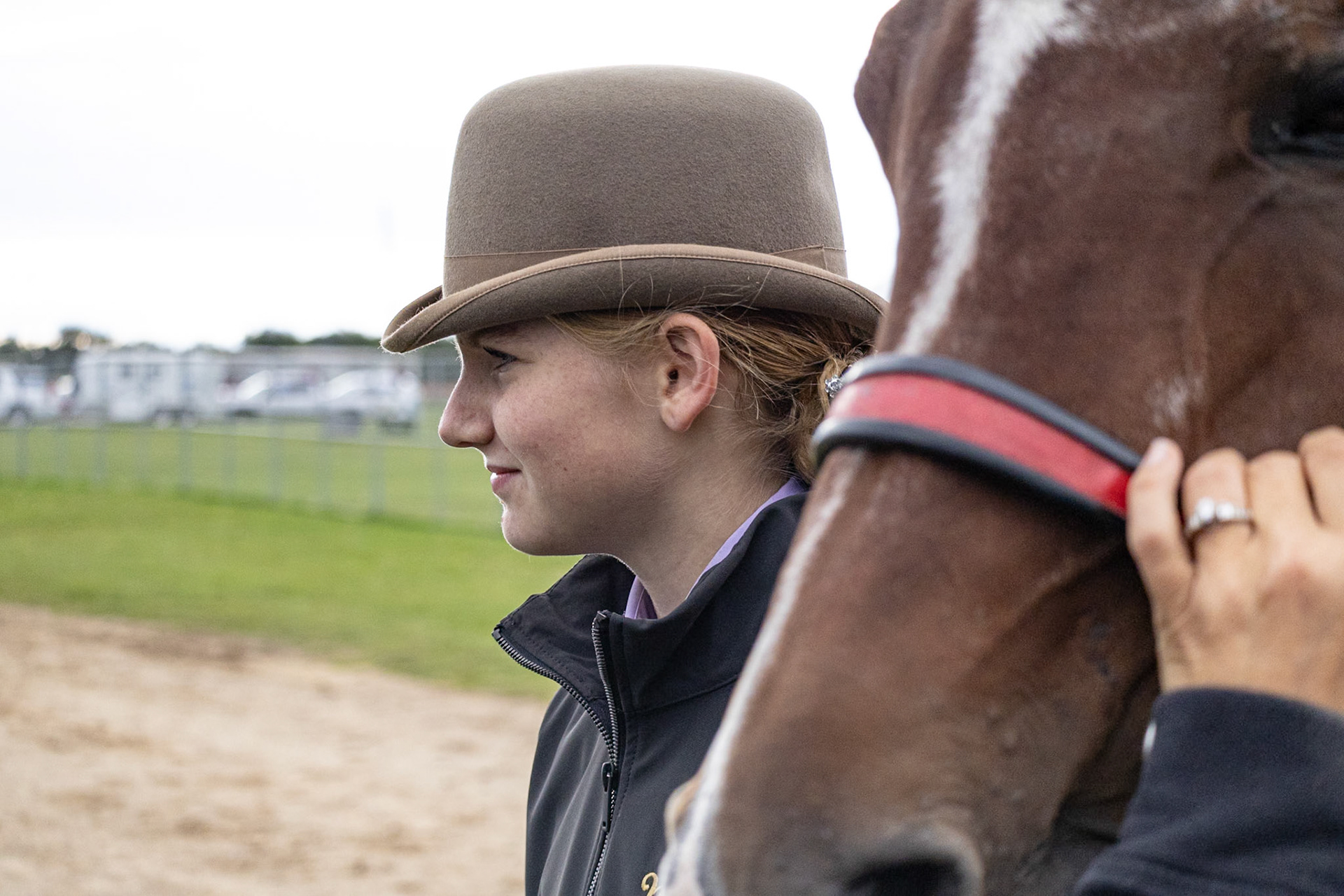 Maci Nichols, a first-year team member, watches the Equestrian competition get underway. (Photo by Valentina Sosa)