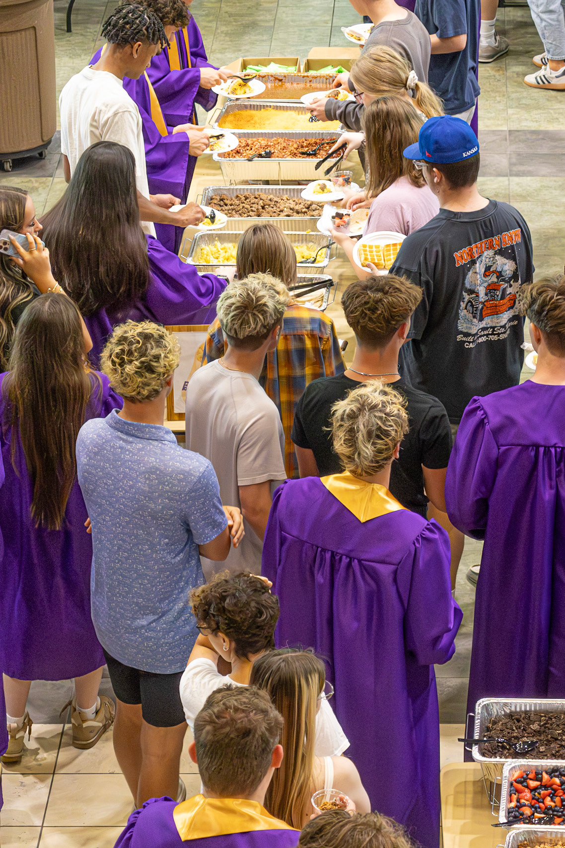 Seniors gather for breakfast before getting ready for the Senior Assembly. (Photo by Emma Garza)