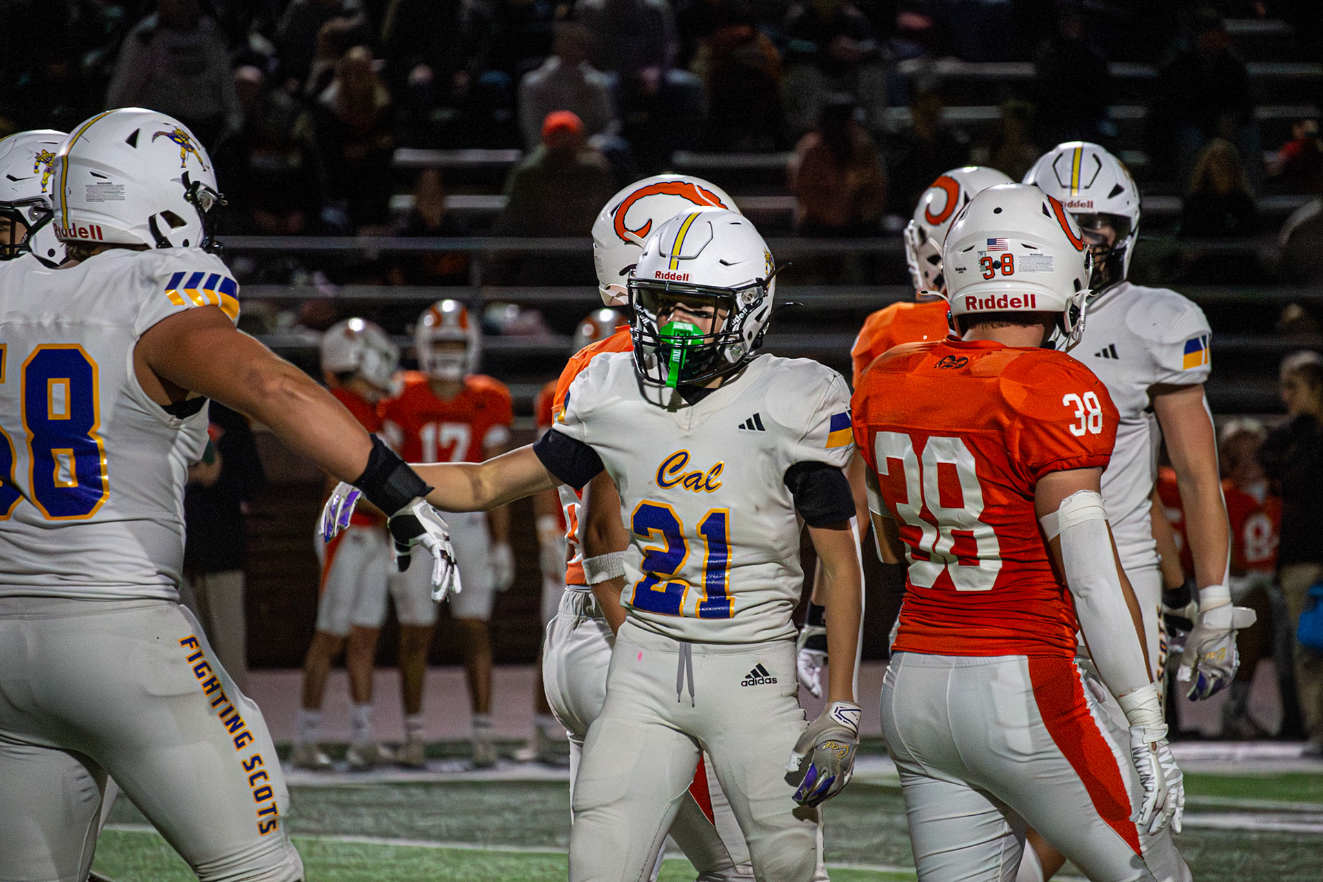 DOWN LOW Junior Tyden Schuch and senior Liam Moore share a low five after a key first down. (Photo by Egan Otto)