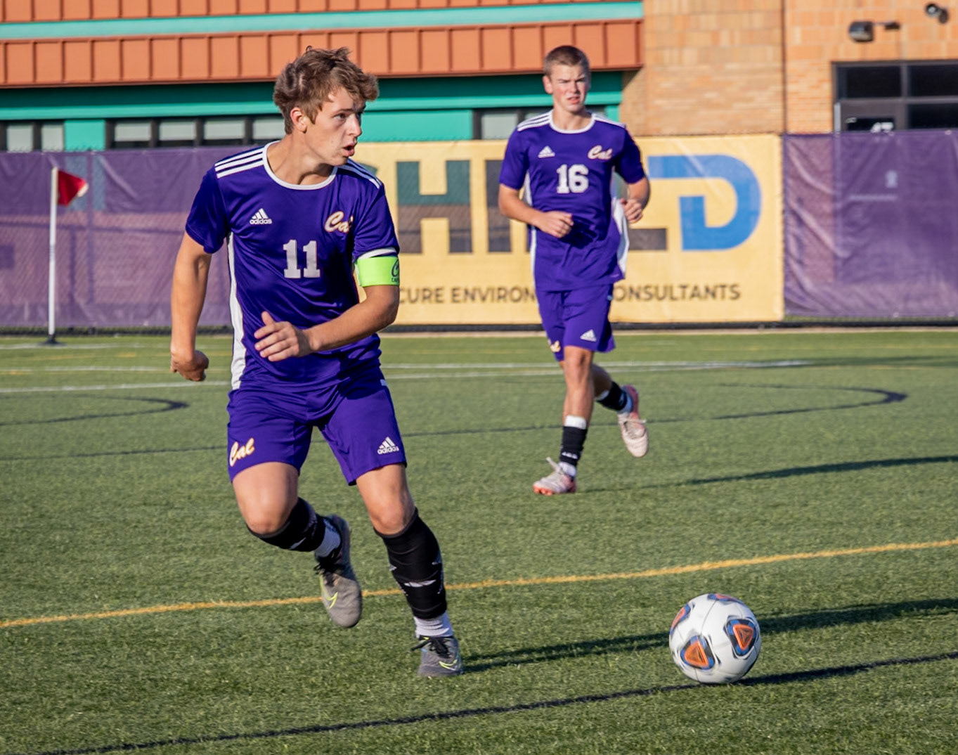 Sean Harney scans the field with the ball at his feet, looking for the next pass. (Photo by Brianne Weih)