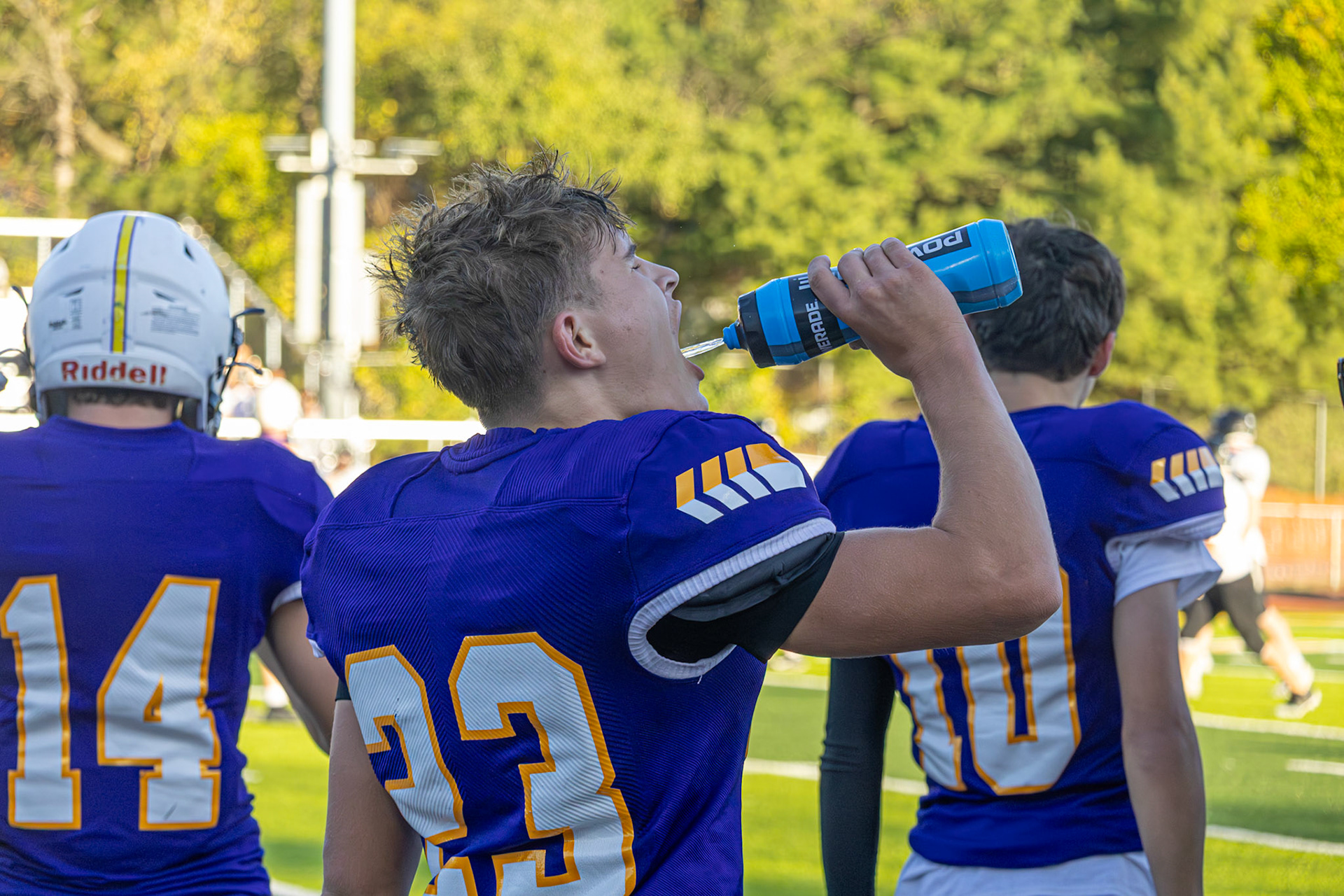 Elliot Hawkins takes a quick drink on the sidelines before rejoining play. (Photo by Ella Wickens)