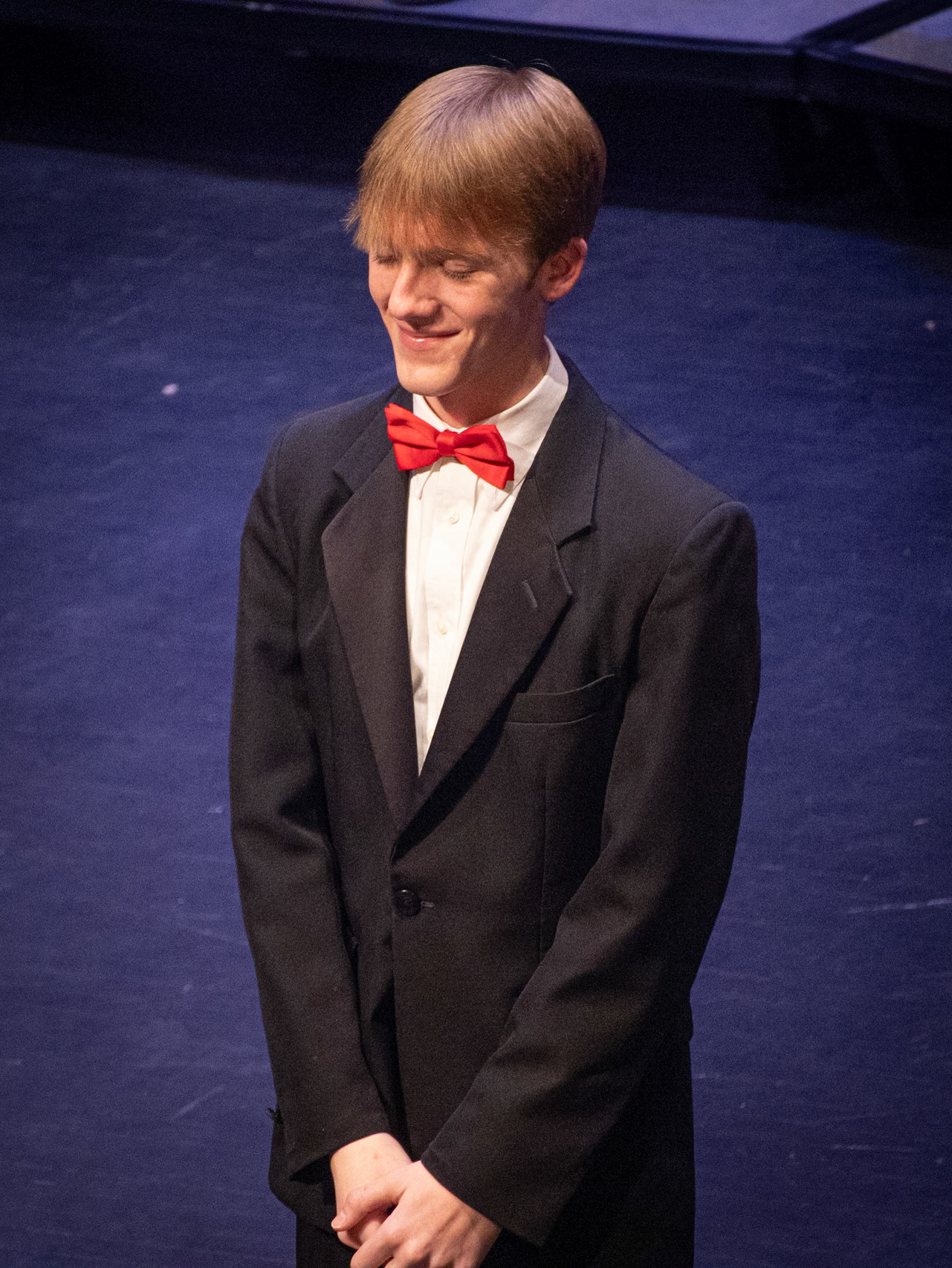 After leading the Treble Choir through The Holly and the Ivy, Christian Moorlag takes a moment to acknowledge the performance.