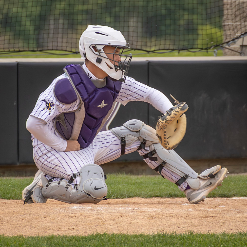 Jackson McNew drops down to block a pitch behind the plate for the Scots. (Photo by Vivian Hoffman)