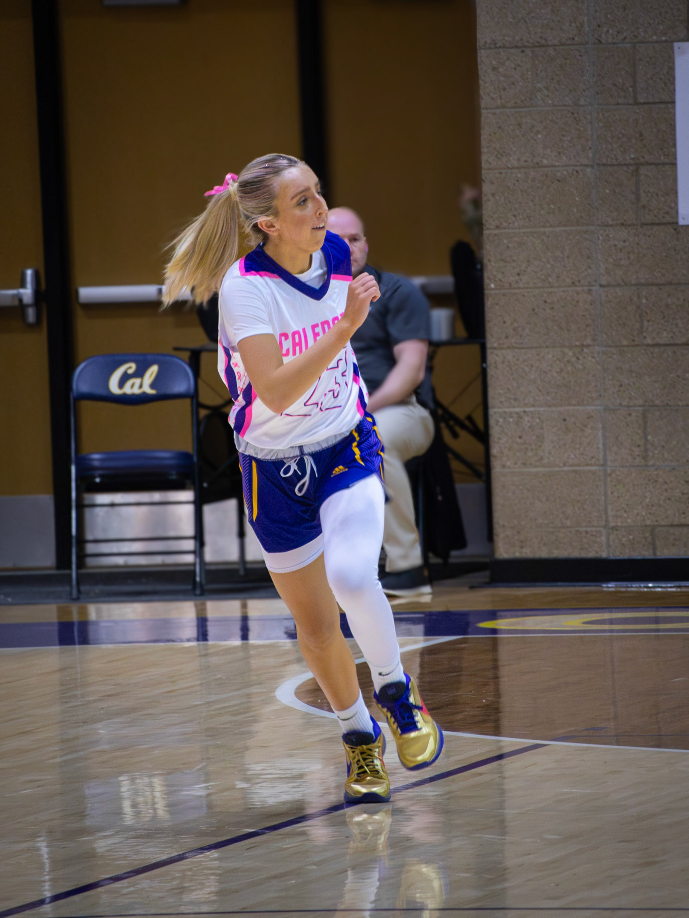 Determined and relentless, Brooklyn McLoed sprints back on defense. (Photo by Aibree Akers)