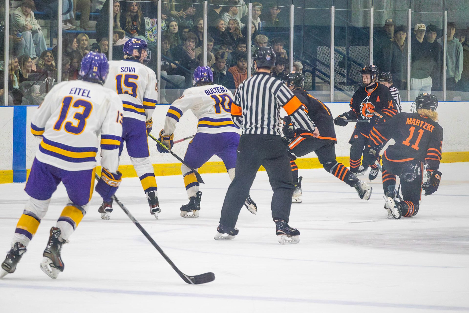 Rylan Bultema tracks the puck across the ice. (Photo by Aaron Pyper)