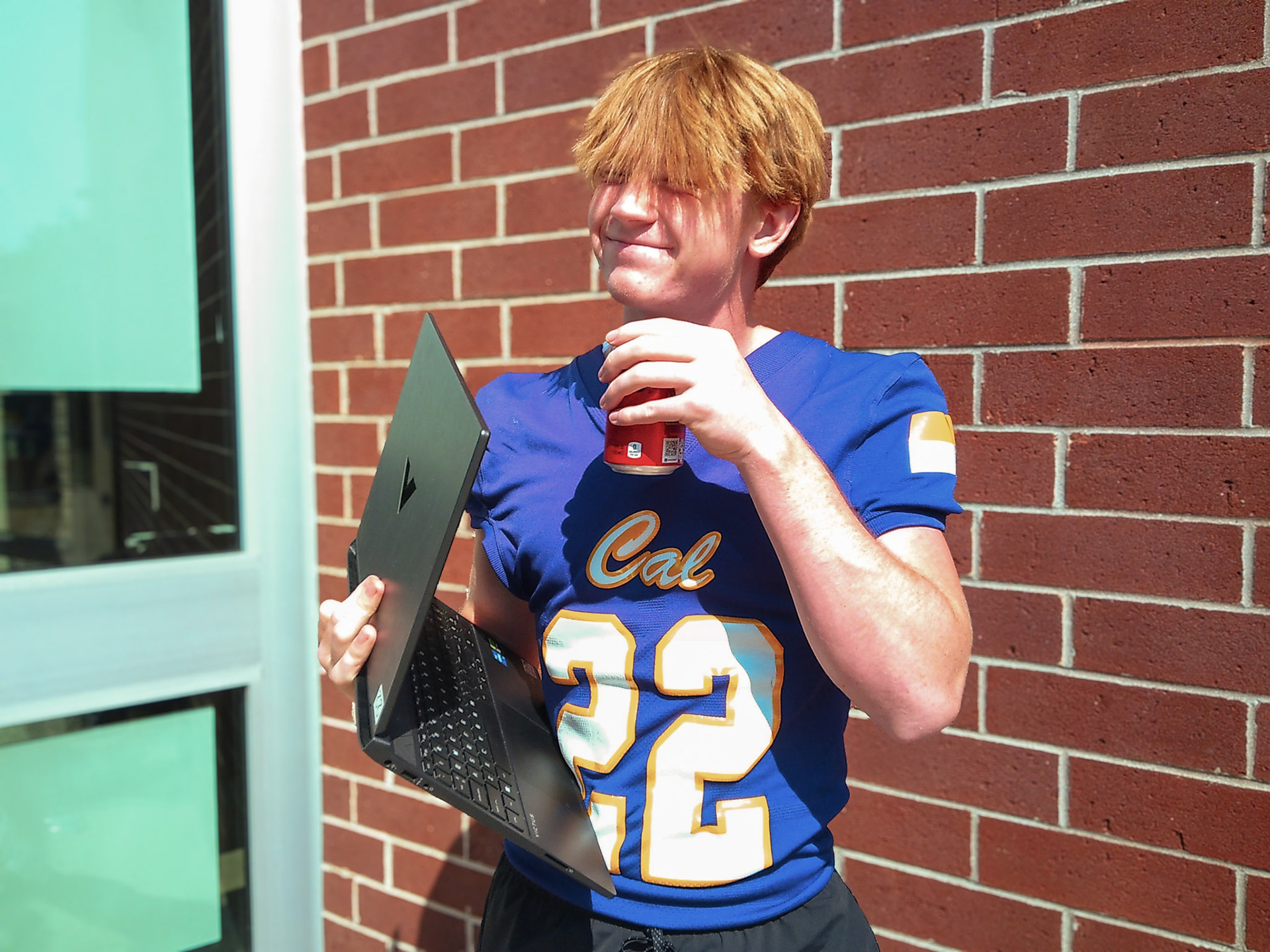 Thomas' mood changed quickly when he got the opportunity to work outside in the sun. (Photo by Avery Helmholdt)