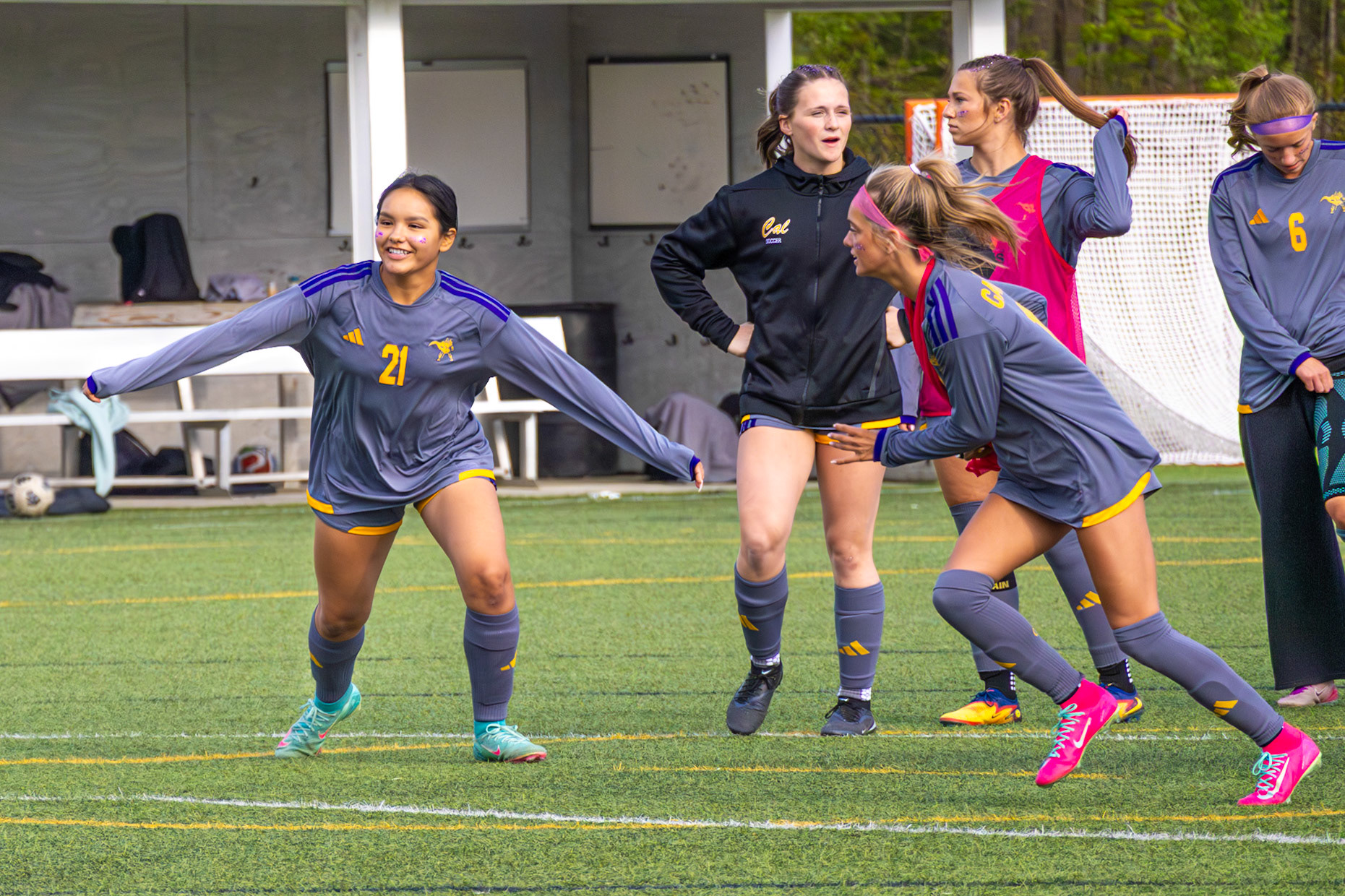 Jazmyn Thompson and Maya Terryn go head-to-head in an intense practice battle before the game.(Photo by Ava LaBine)