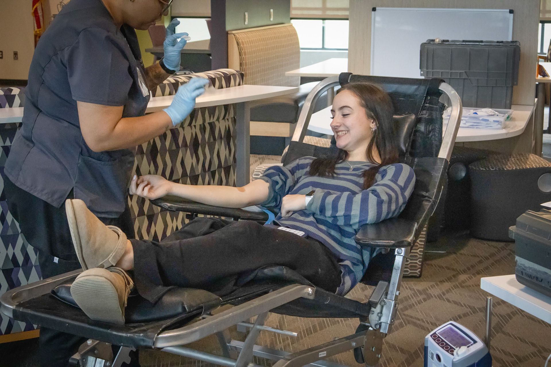 Lilli Jackson thanks the amazing phlobotomist who helped her donate blood at the NHS blood drive. (Photo by Ella-Grace Wickens)