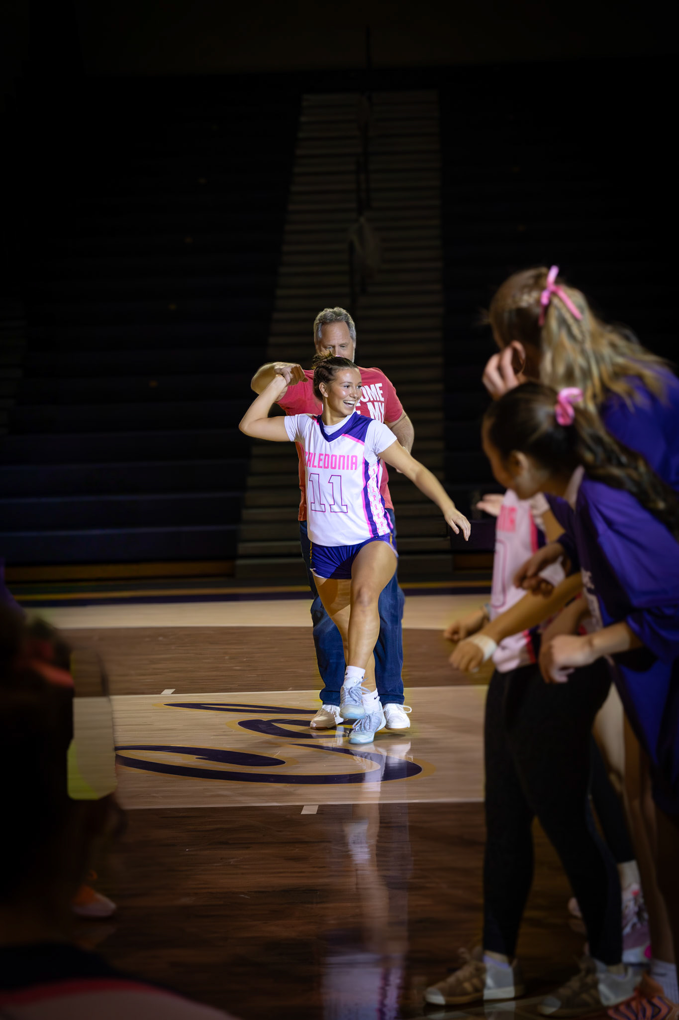 Baylee DeVries shares one last pregame dance with her dad on senior night. (Photo by Aibree Akers)