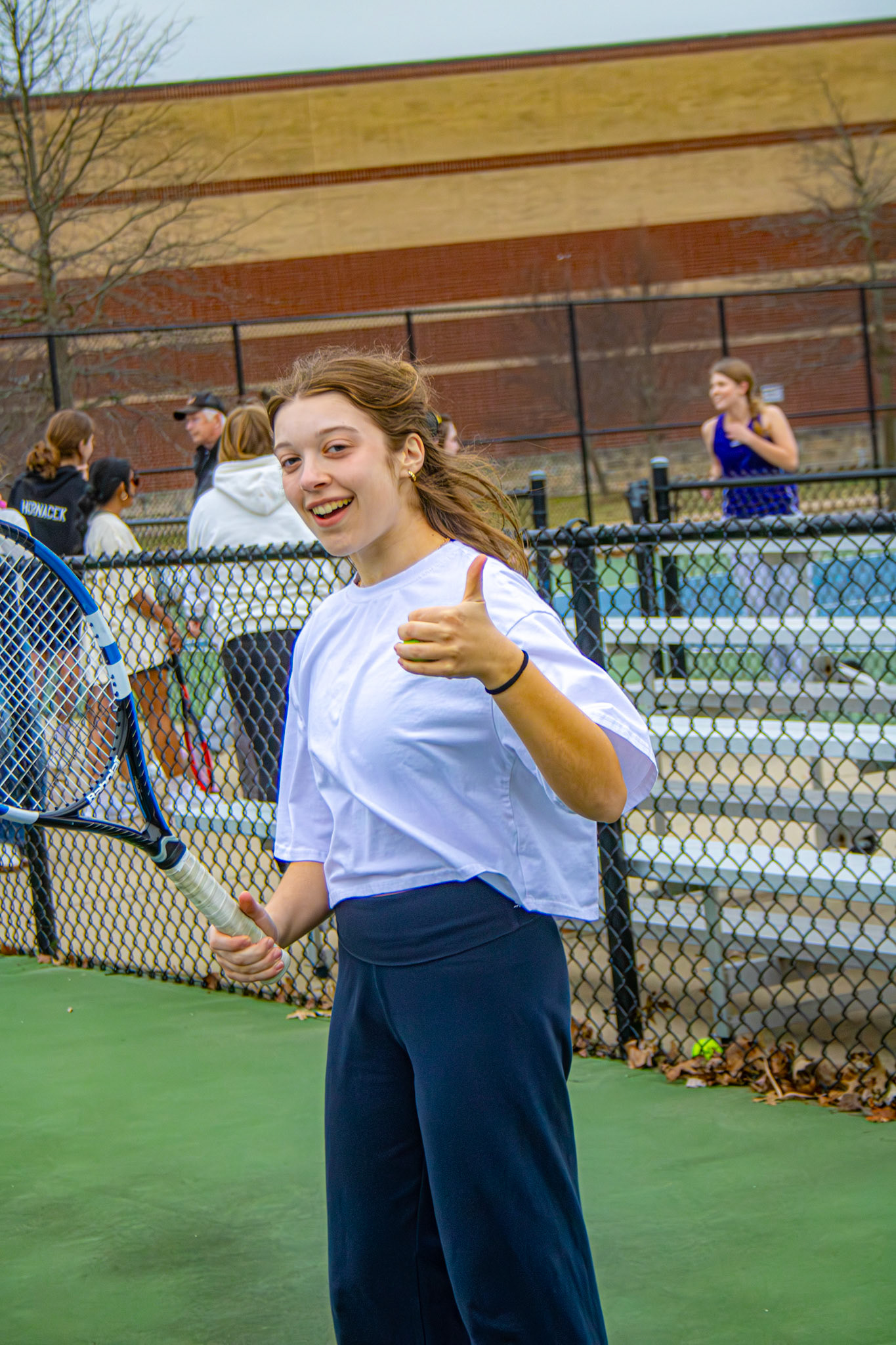 Evie Smith joyfully looks at the camera ready for a fun day of practice. (Photo by Joseph Dunn)