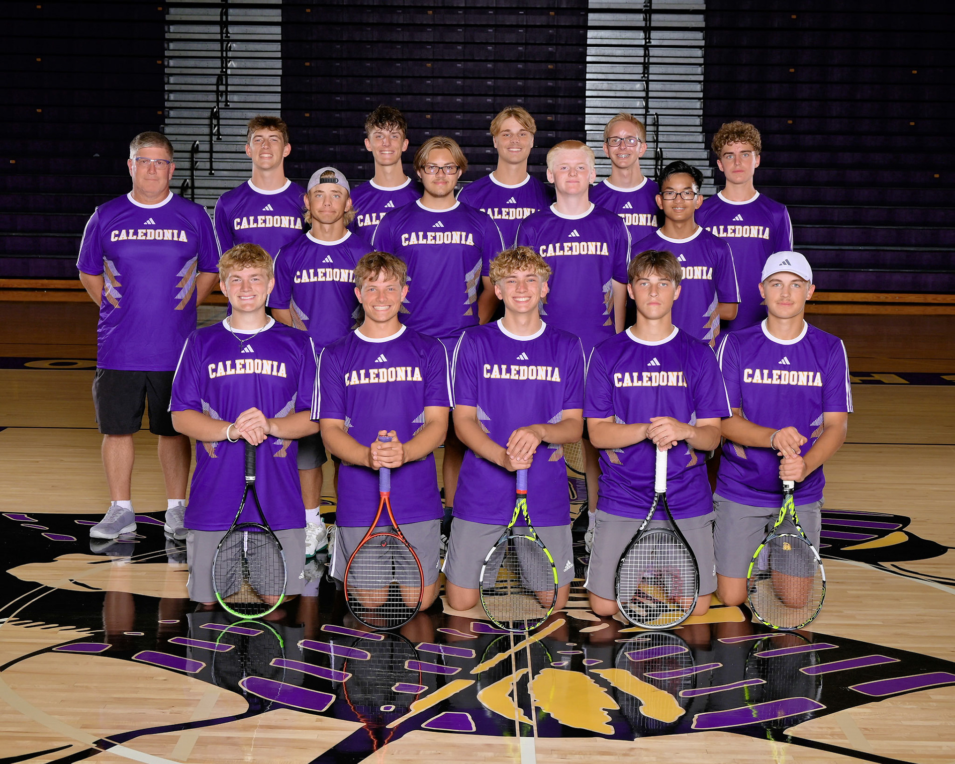 Varsity Boys Tennis (Photograph displayed with permission from Geskus Photography Inc.)