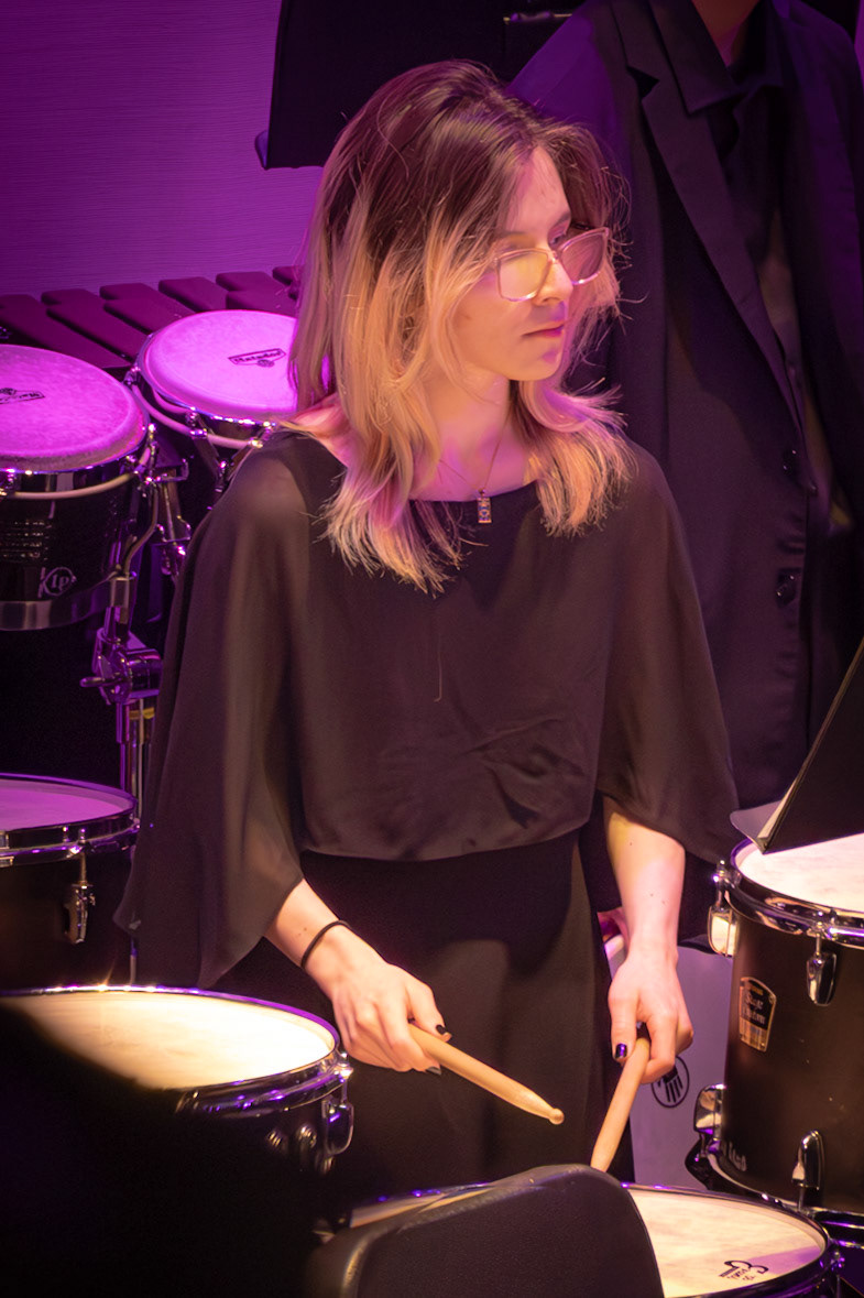 Quin Sierra waits patiently for her cue on the drums. (Photo by Mackenzie Popma)
